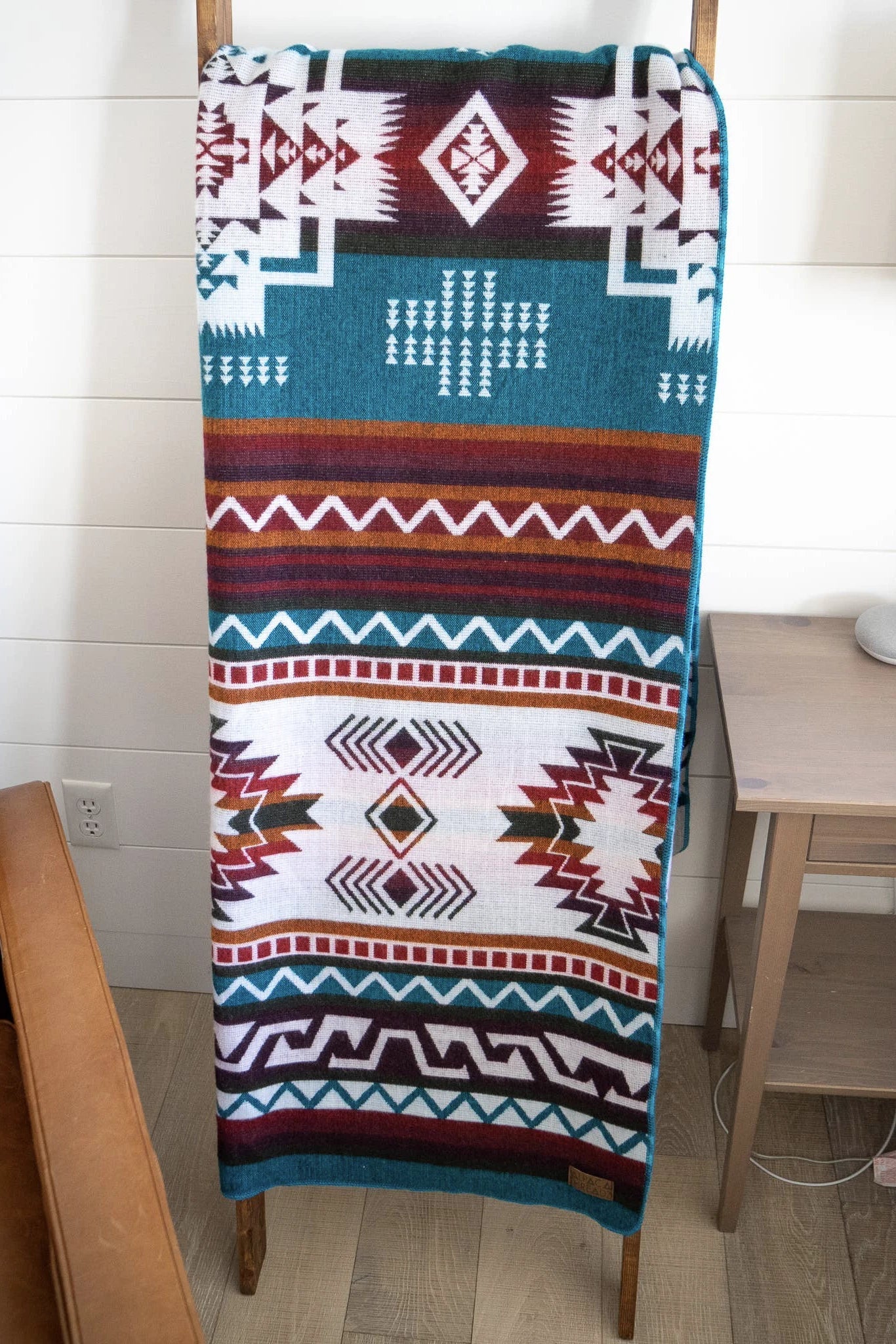 Andean Turquoise Alpaca Wool Blanket laying on ladder leaning on wall - L'Atelier Global