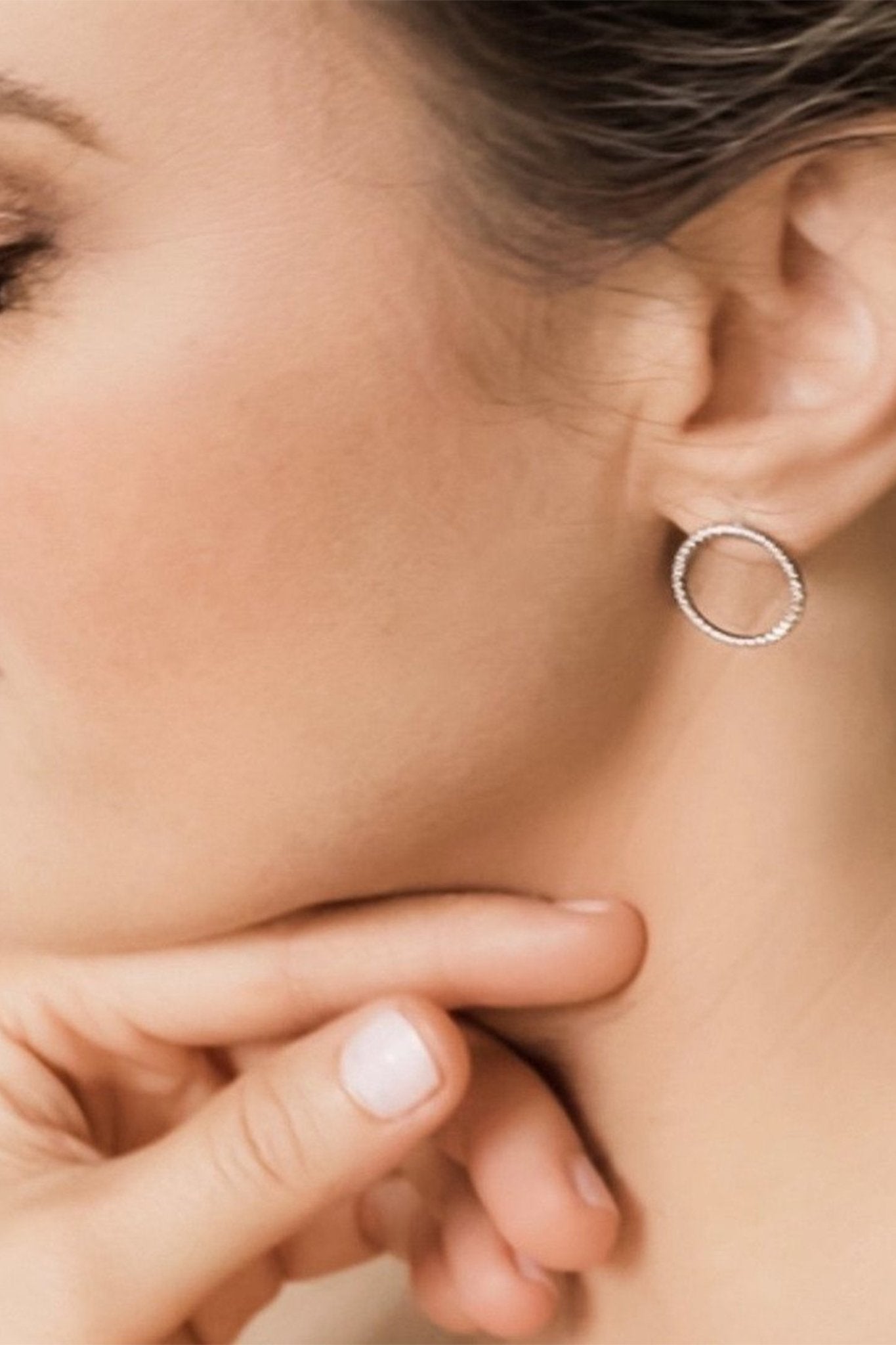 Arezzo Mini Circle Earrings in gold on a female model- L'Atelier Global