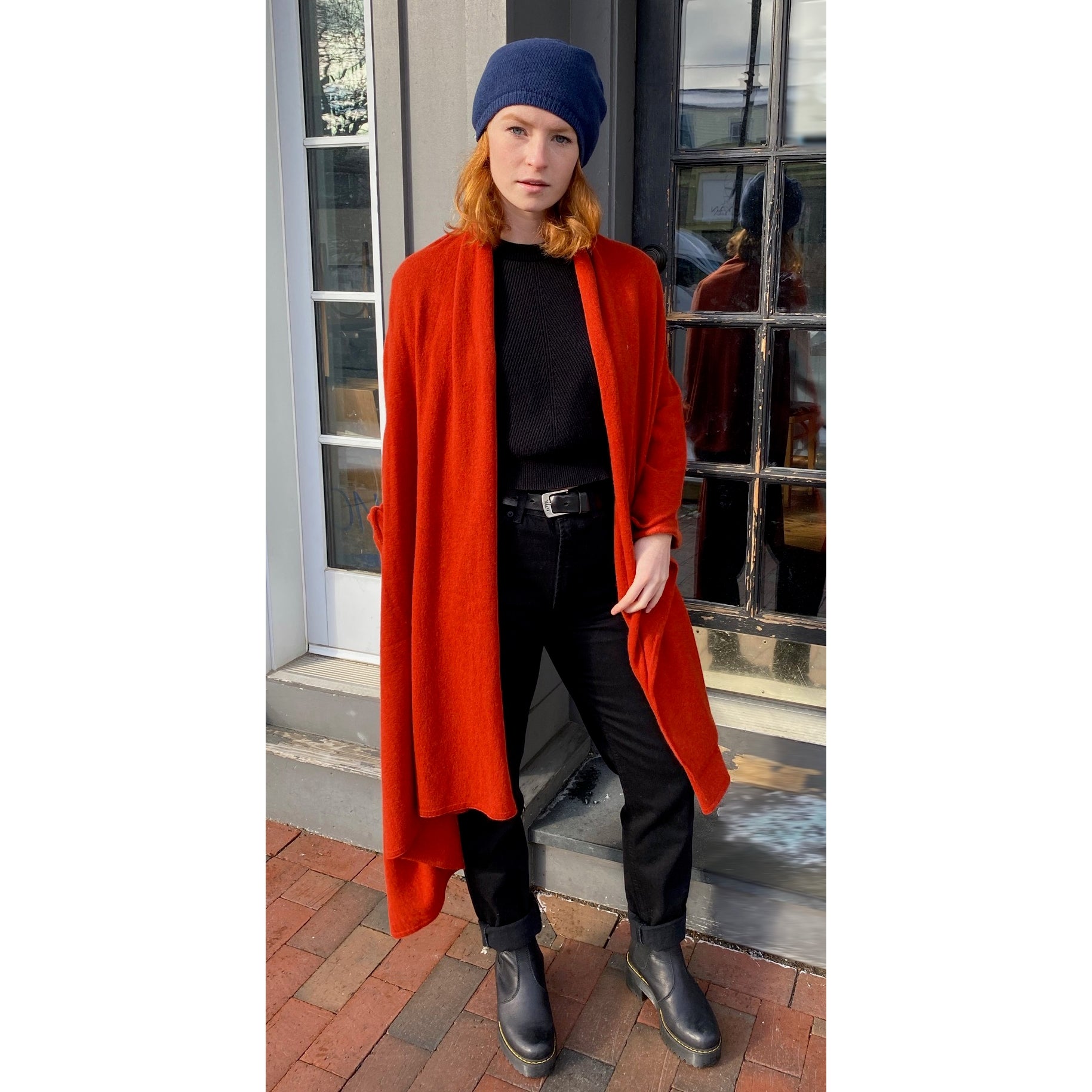 Avellina Cashmere-Blend Wrap in red on model showing length when worm over shoulders - L'Atelier Global