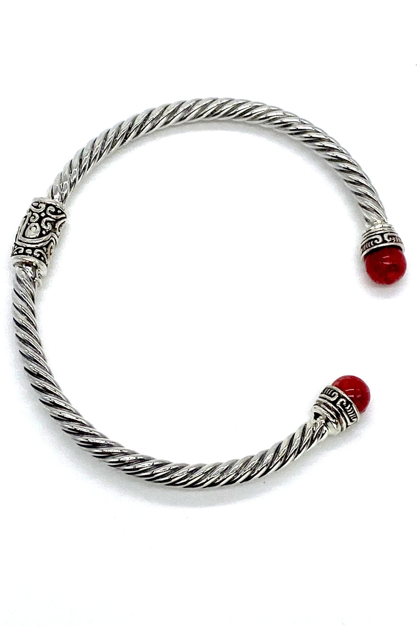 Balinese Silver Hinged Bracelet in Coral  on a white background.