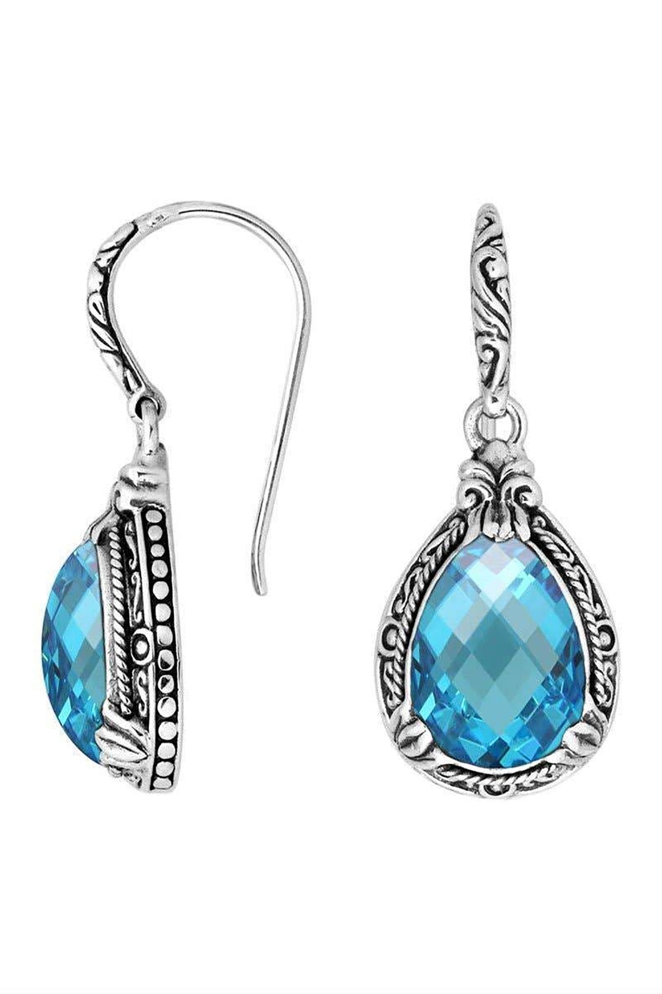 Balinese Sterling Silver Earrings in Blue Topaz on a white background