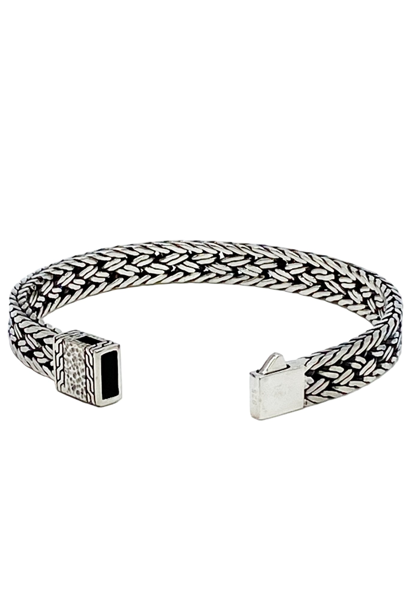 Balinese Woven Sterling Silver Bracelet on a white background unclasped