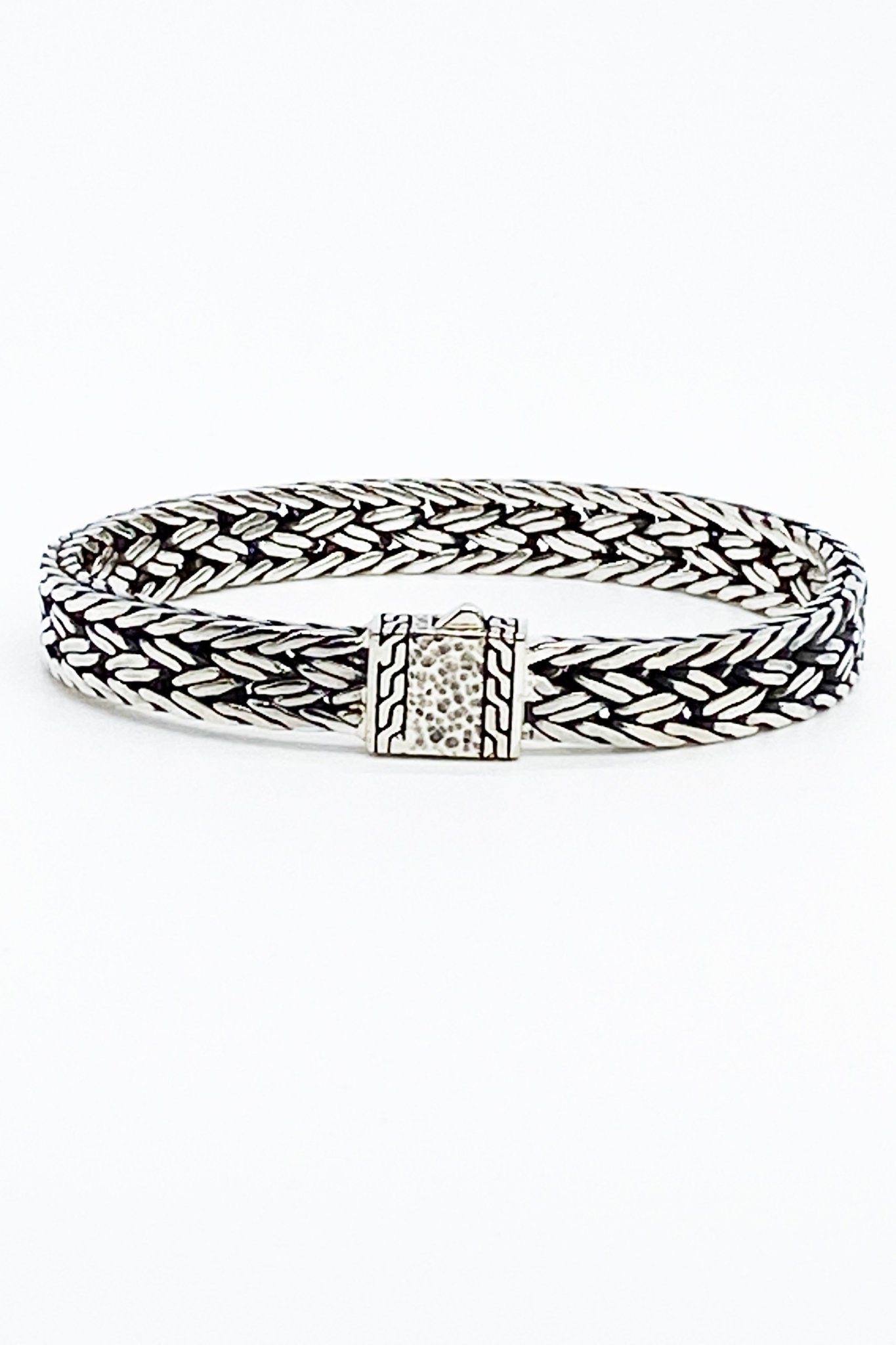 Balinese Woven Sterling Silver Bracelet on a white background clasped
