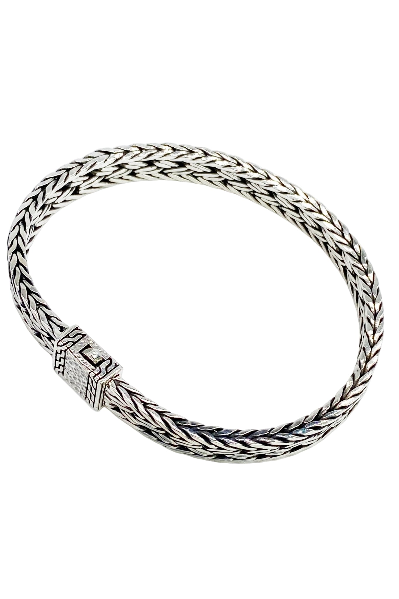 Top view Balinese Woven Sterling Silver Bracelet on a white background