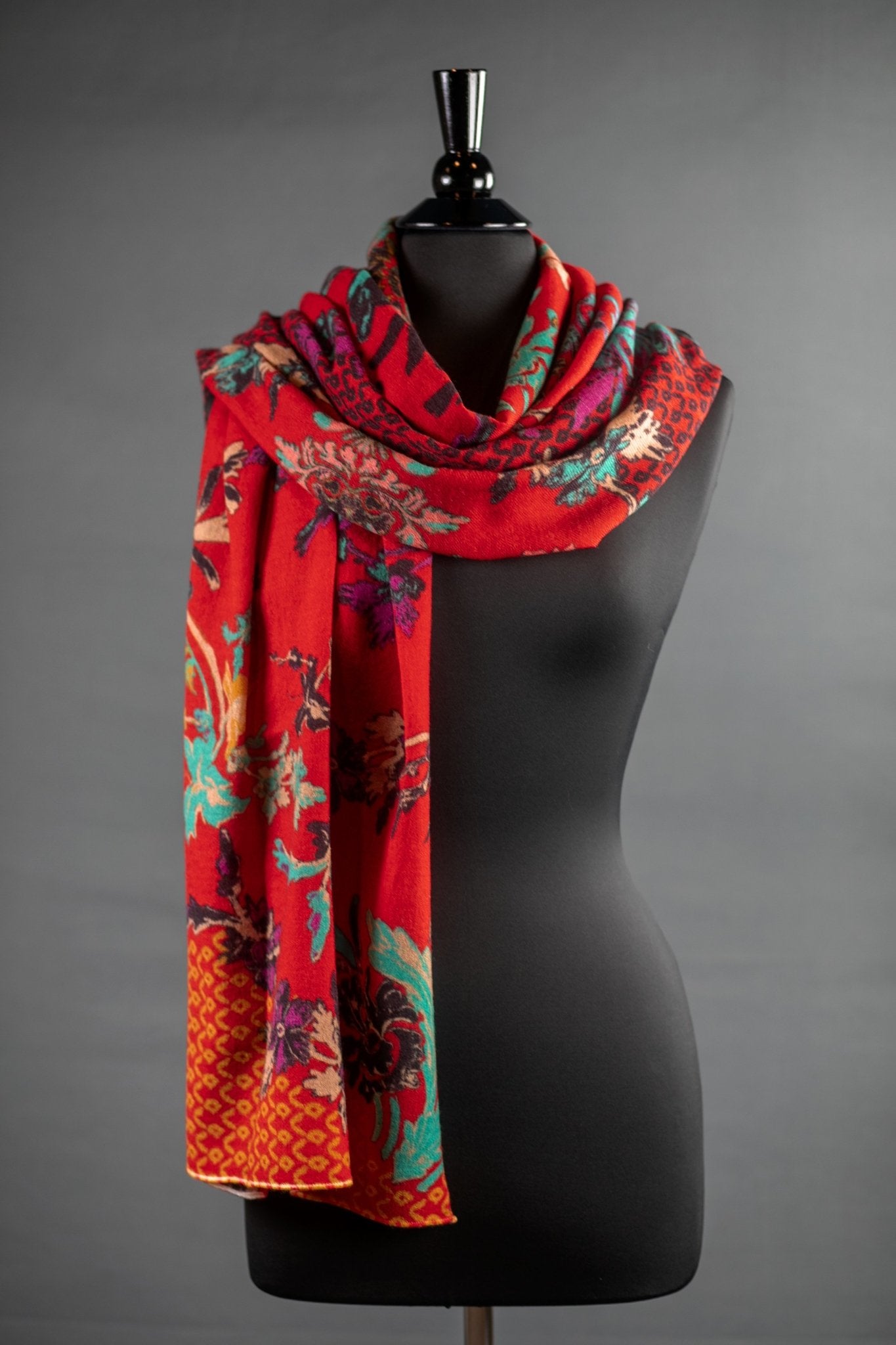 Botanical Garden Serbian Merino Wool Shawl in Red on a black bust Form on a gray background