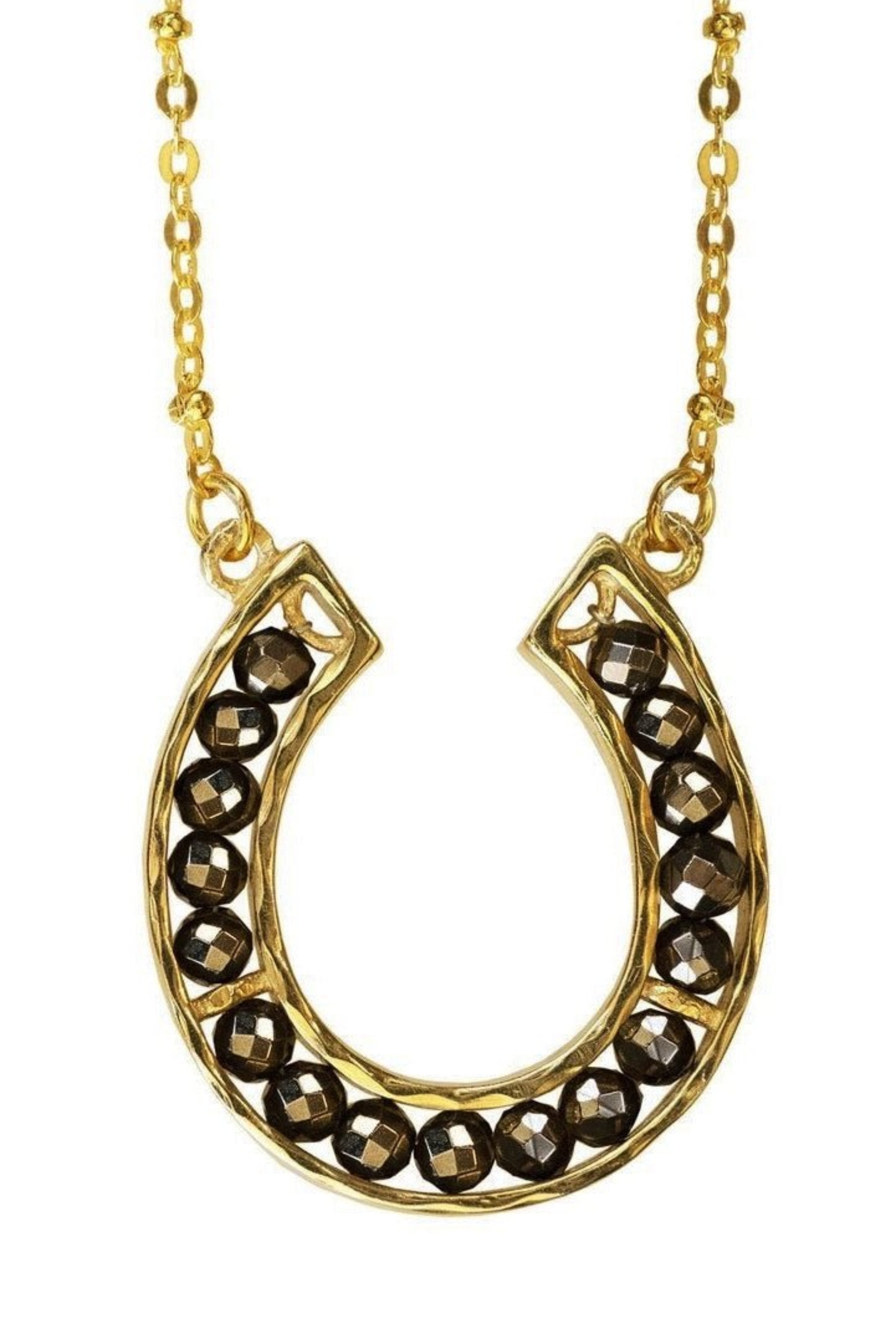Capriole Horseshoe Necklace on a white background