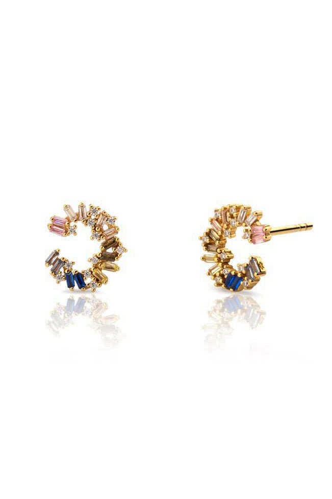 Caracola Circle Earrings in gold on a white background
