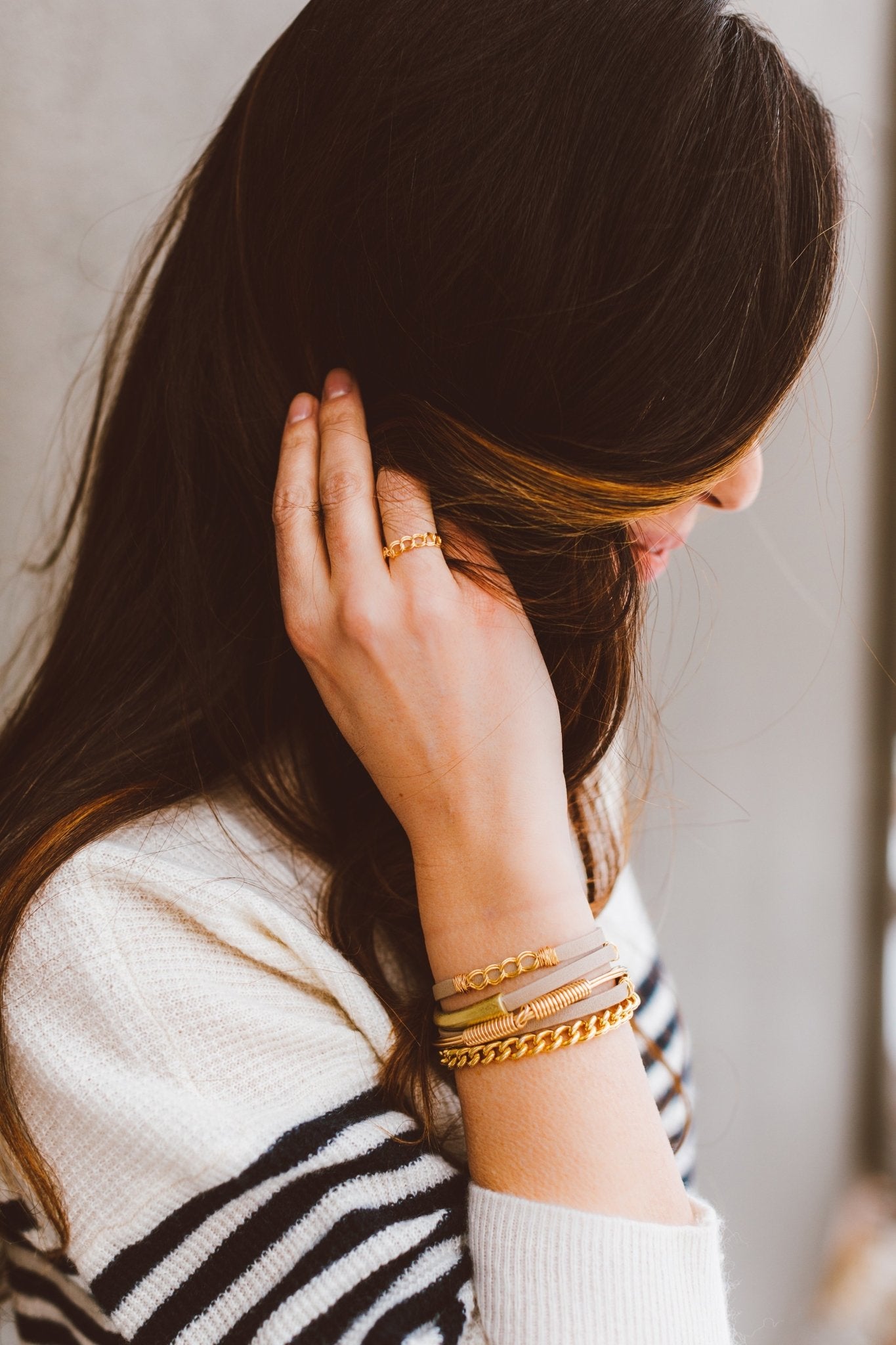 Curb Leather Triple Wrap Magnetic Bracelets on a female model