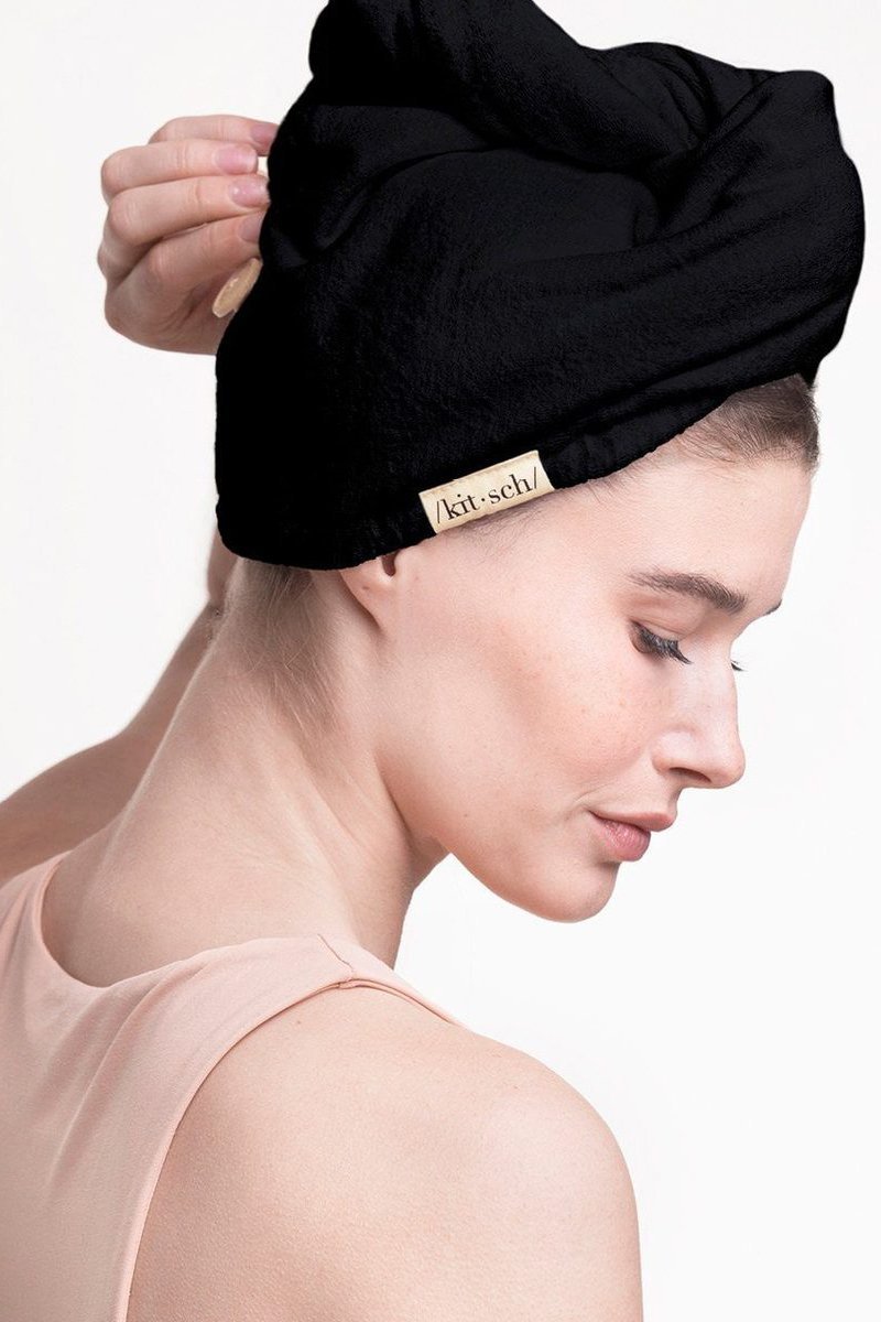 Eco-Friendly Microfiber Hair Towel in black on black on a model