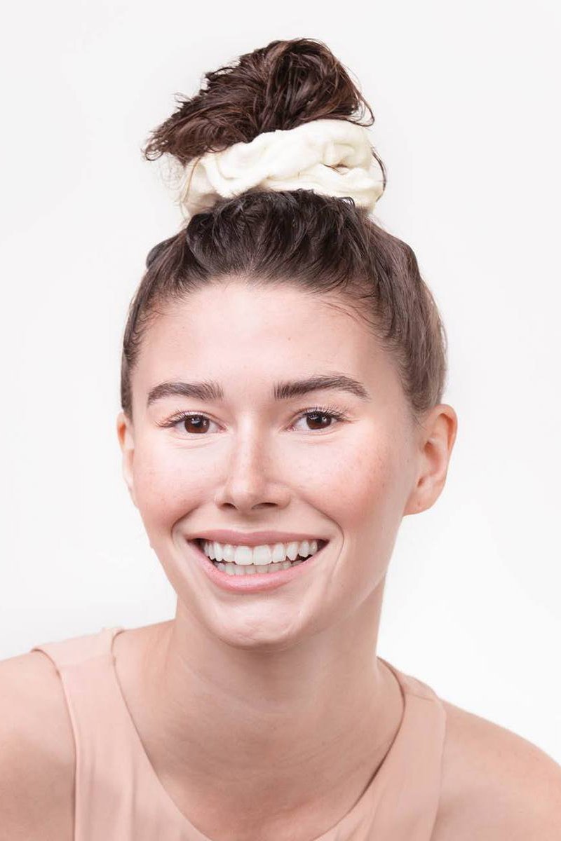 Eco-Friendly Towel Scrunchies in ivory on model on a white background