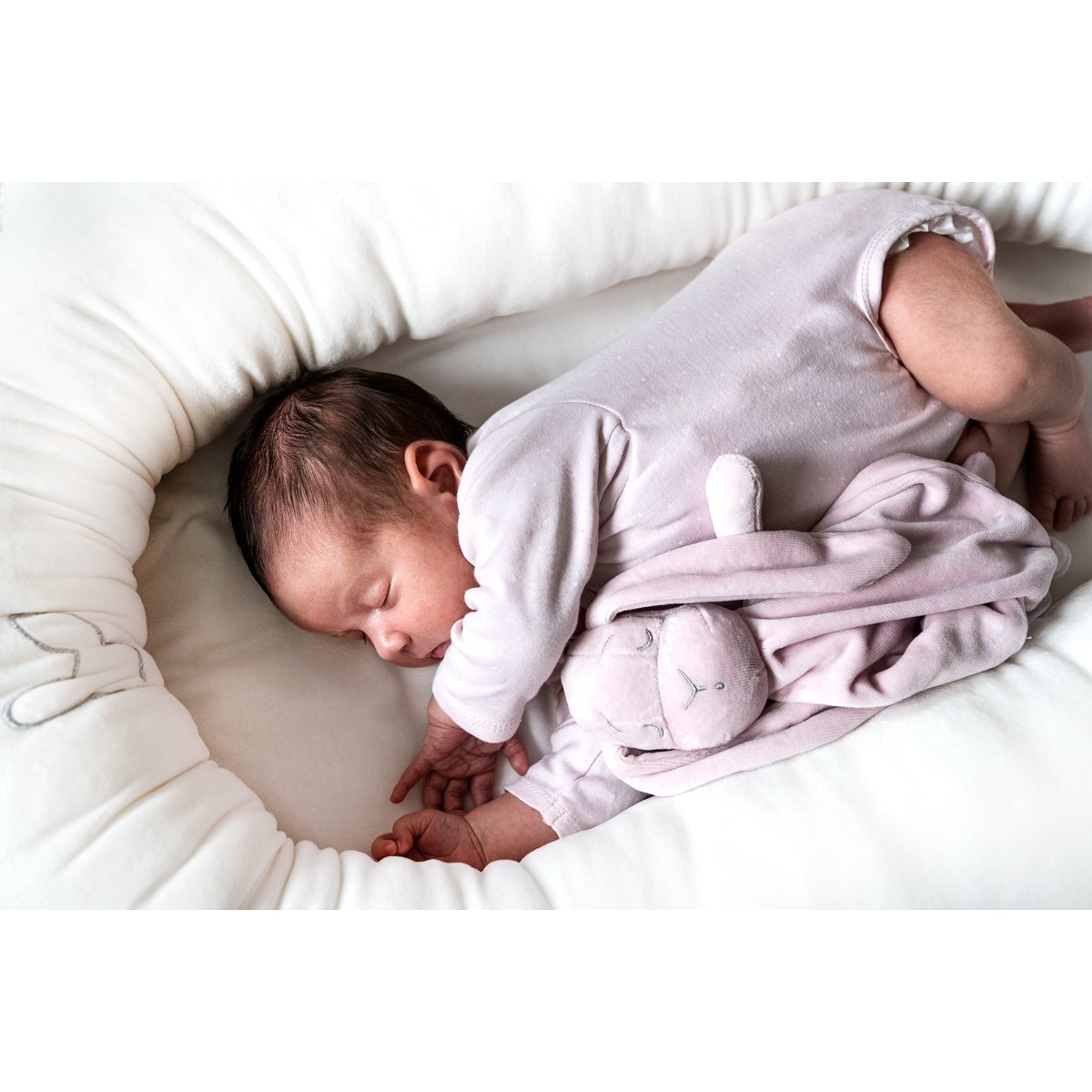 Effik Doudou in Pink in an adorable babies hands - L'Atelier Global
