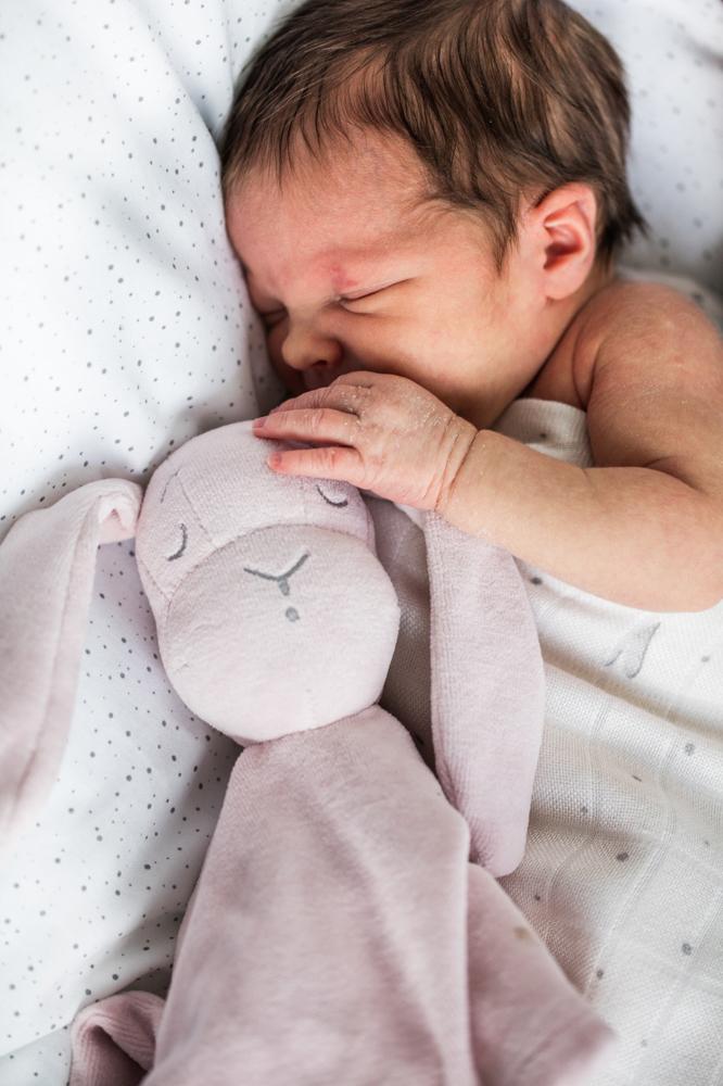 Effik Doudou in Pink in an adorable babies hands - L'Atelier Global