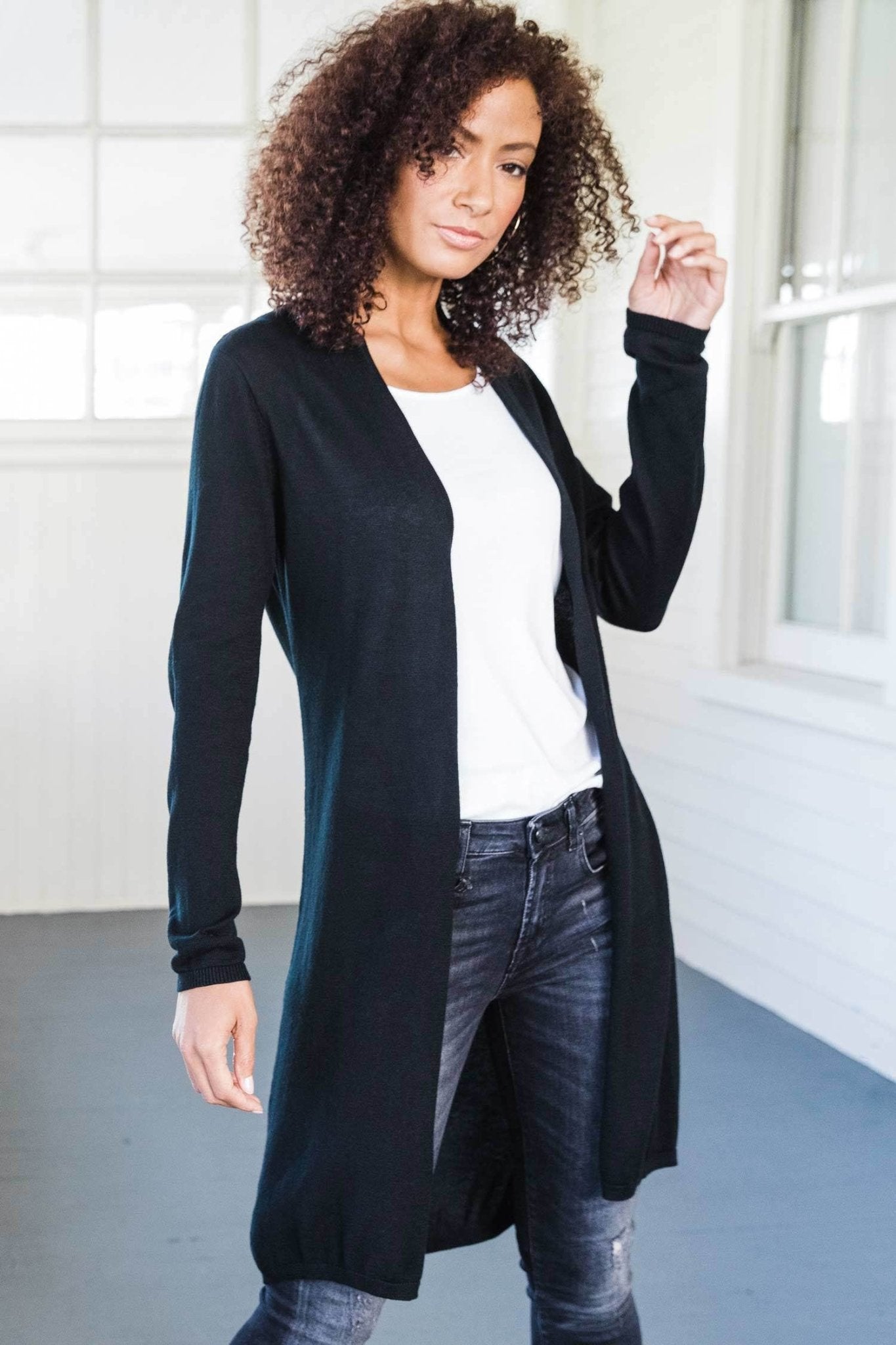 Essential Pima Cotton Knit Cardigan on a Female Model wearing jeans and a white shirt - L'Atelier Global
