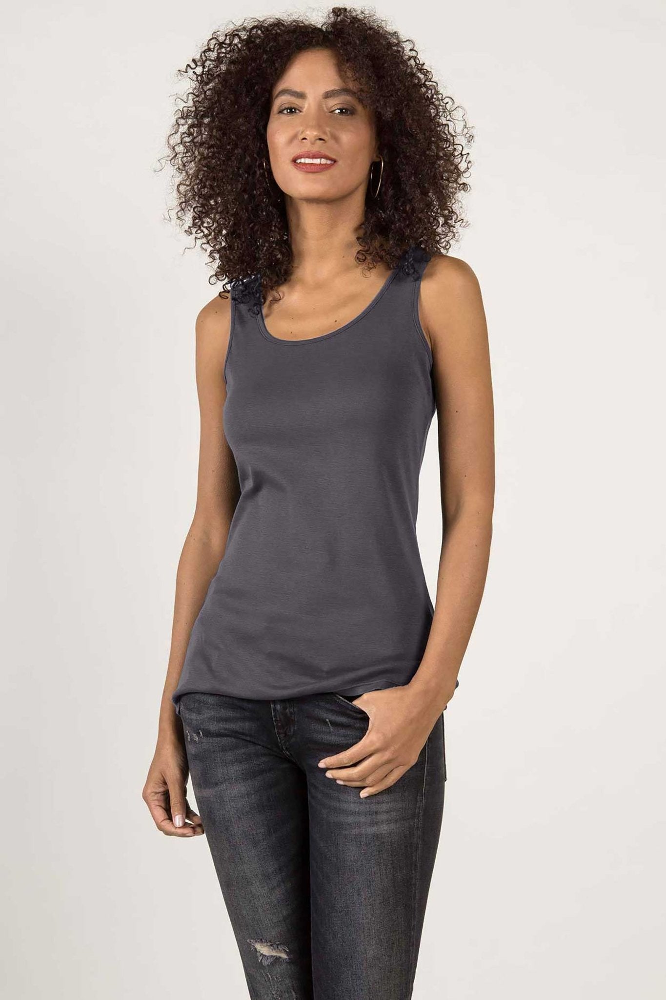 Essential Pima Cotton Long Layering Tank in Fossil green on a female model wearing dark jeans- L'Atelier Global