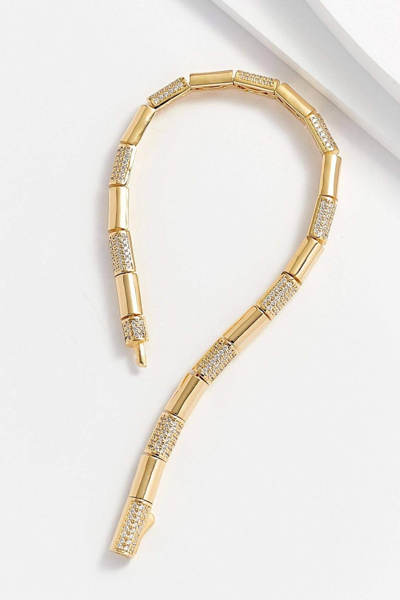 Eternal Link Gold Bracelet opened on a white background- L'Atelier Global