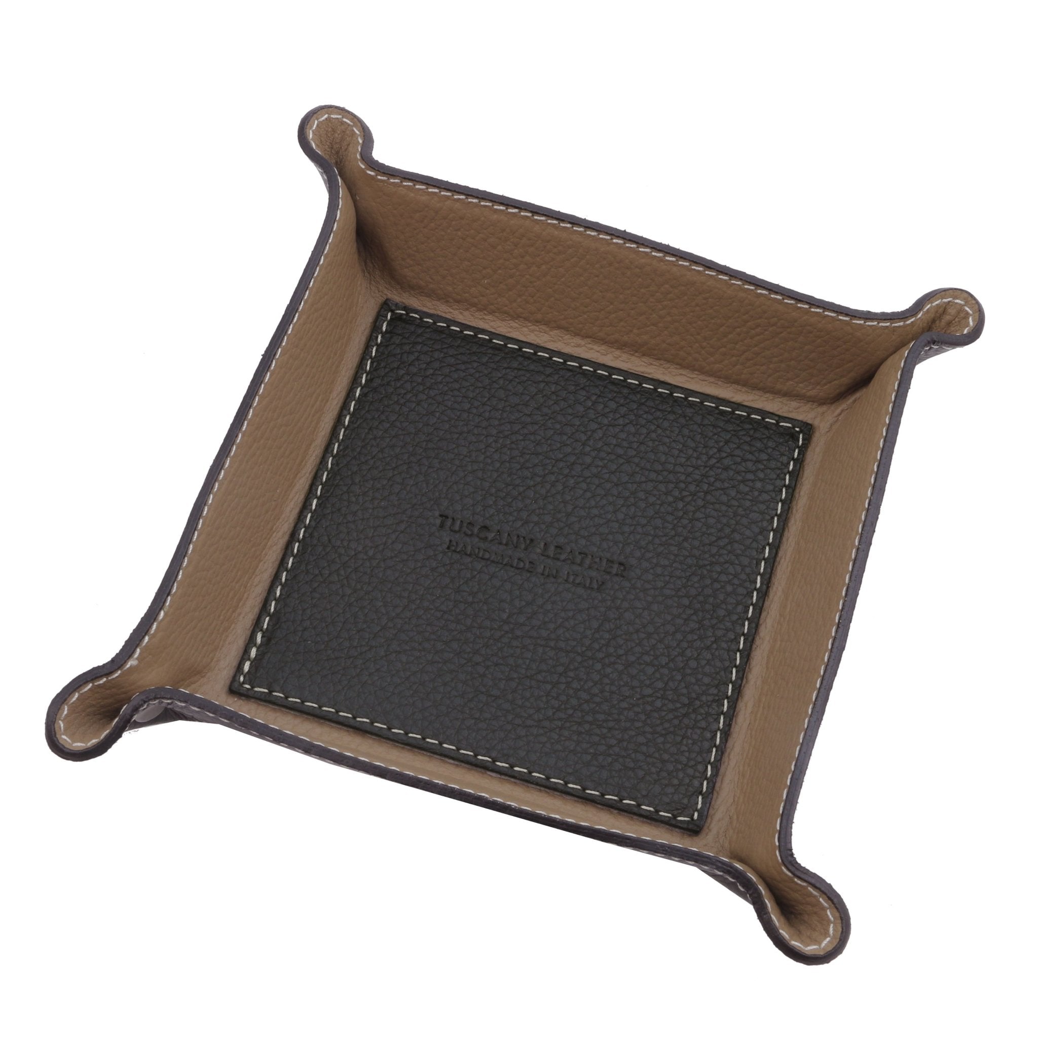 Exclusive Leather Valet Tray in black on white background, featuring a black interior bottom with the Tuscany Leather embossed logo and light brown interior sides.