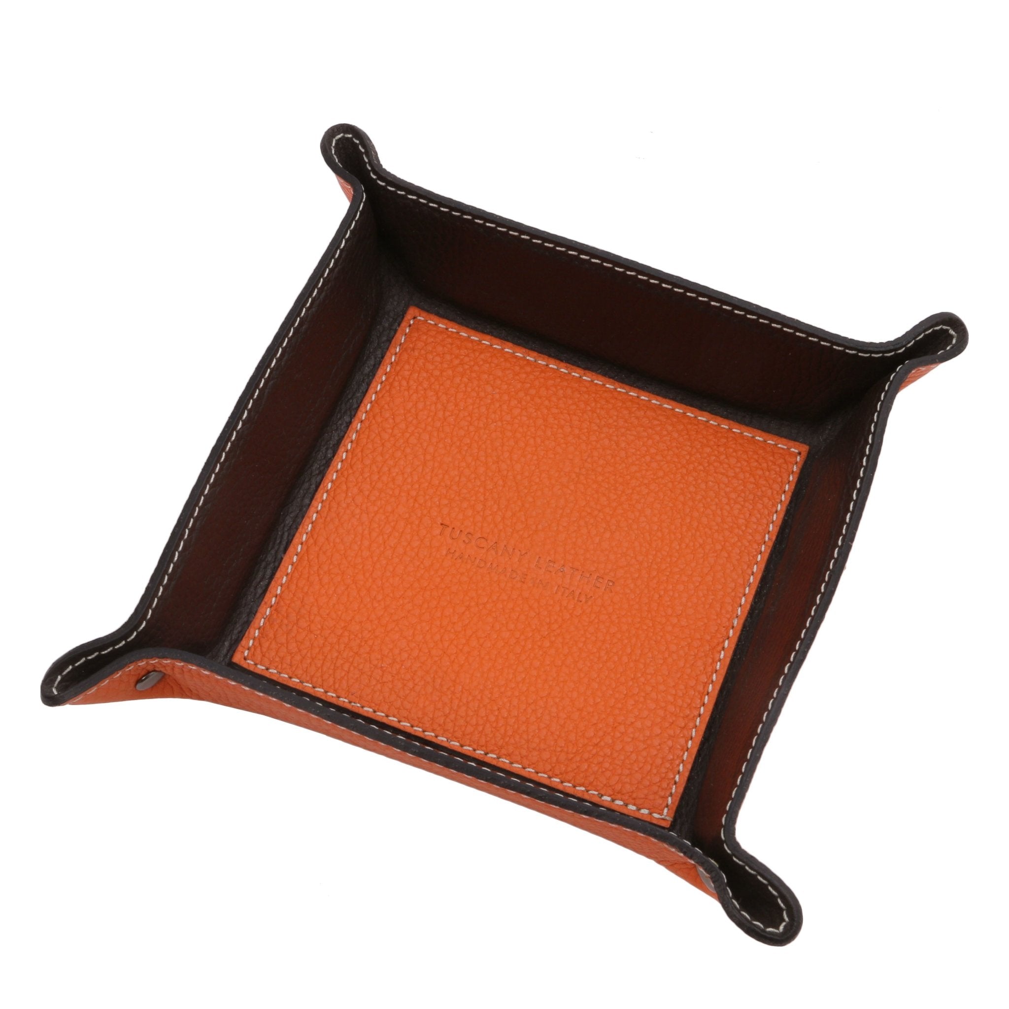 Exclusive Leather Valet Tray in orange on a white background, featuring orange interior bottom with the Tuscany Leather embossed logo and brown interior sides.