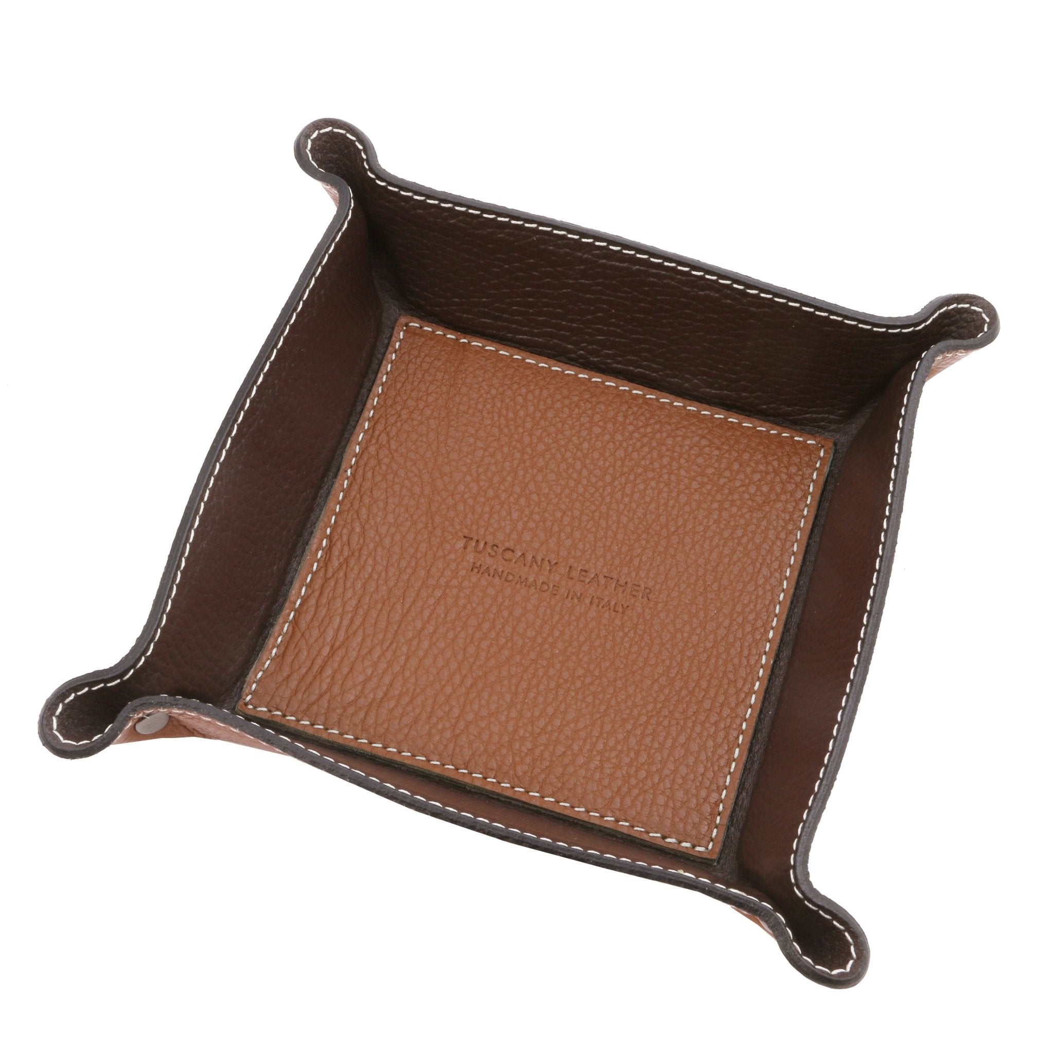 Exclusive Leather Valet Tray in cognac on a white background, featuring a cognac interior bottom with the Tuscany Leather embossed logo and brown interior sides.