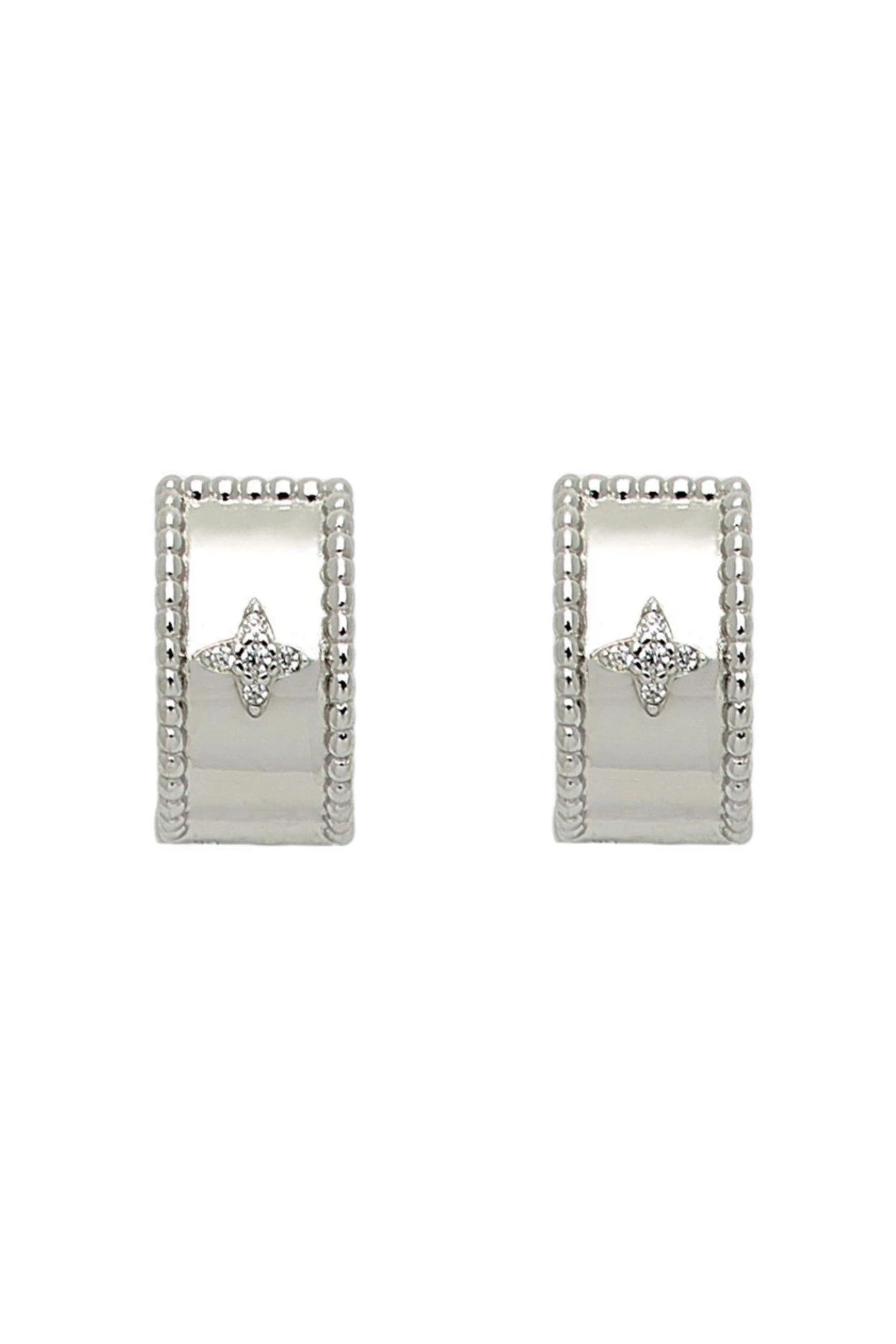 Firenze Cuff Star Earrings in silver on a white background. The vintage diamond star shape is seen in the front of the hoop.