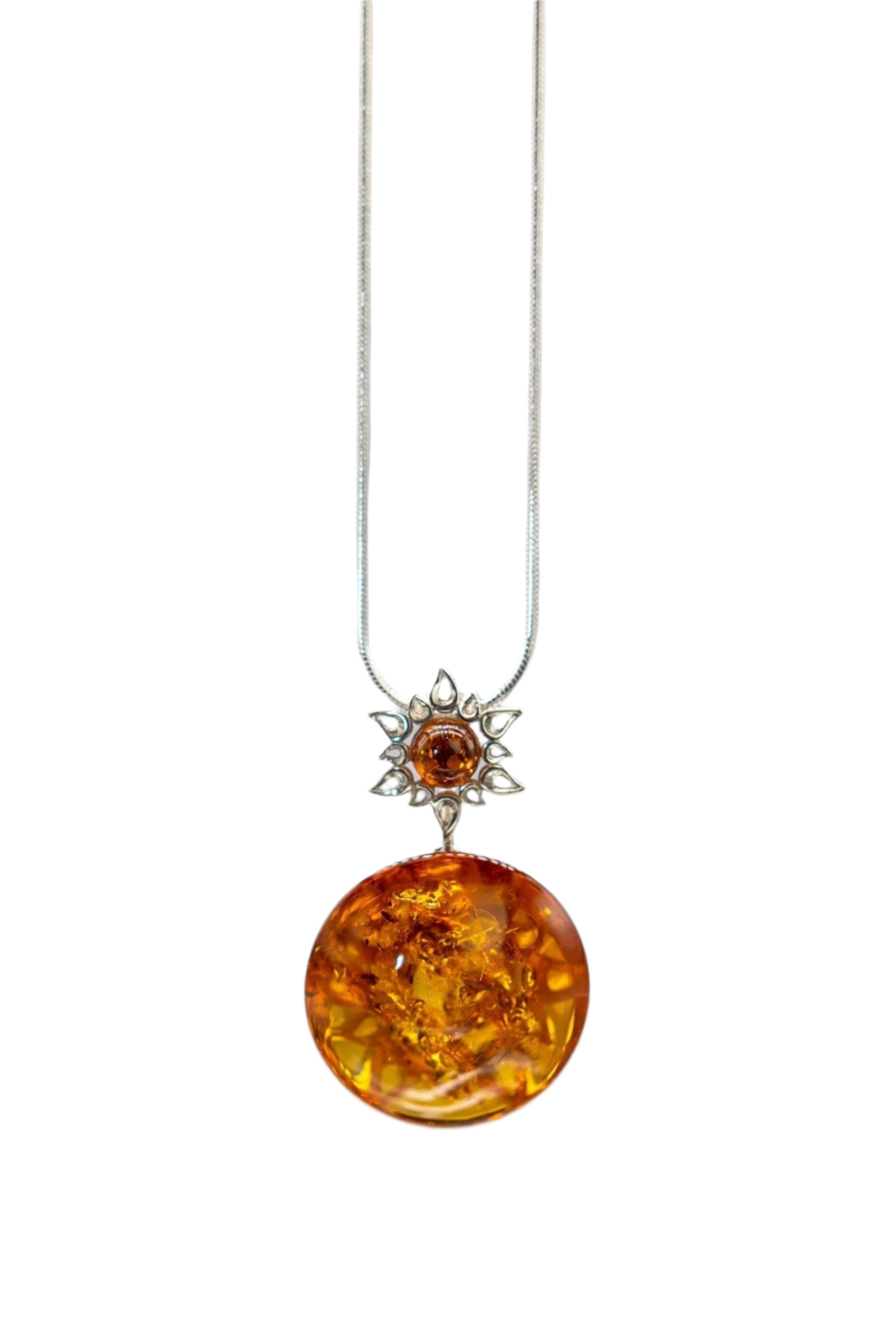 Honey Amber Star Necklace hanging on a white background