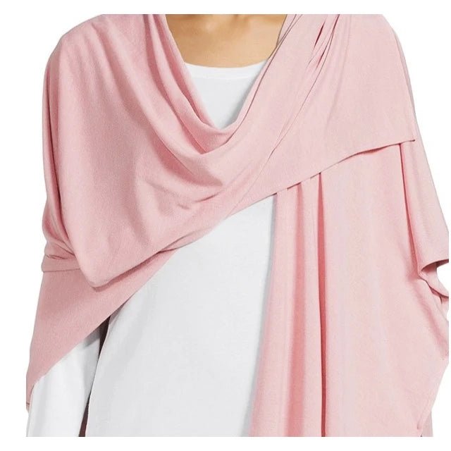 Ischia Cotton Blend Wrap in pink close up of models shoulders - L'Atelier Global