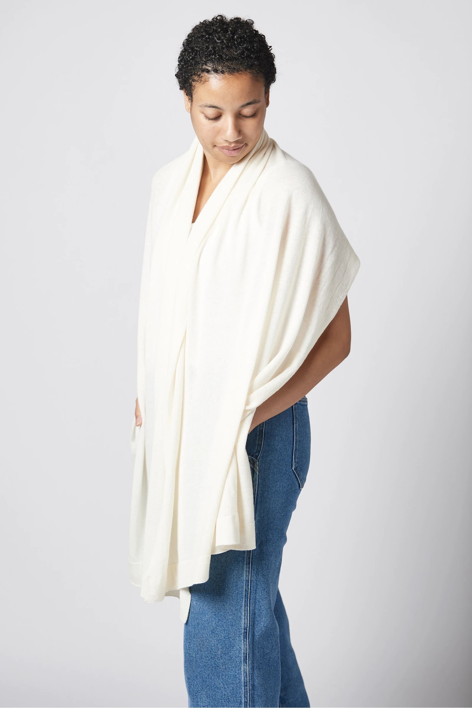 Ischia Cotton Blend Wrap in white on model around her neck - L'Atelier Global