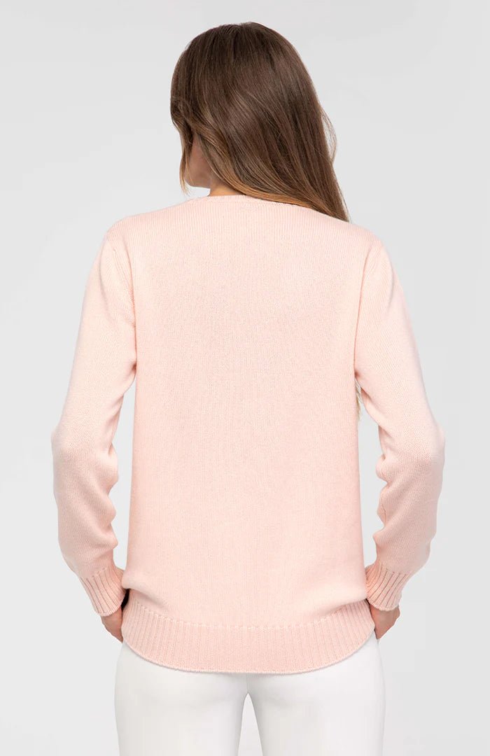Back view of Italian Fine Cashmere Crewneck in pink on model wearing white pants - L'Atelier Global