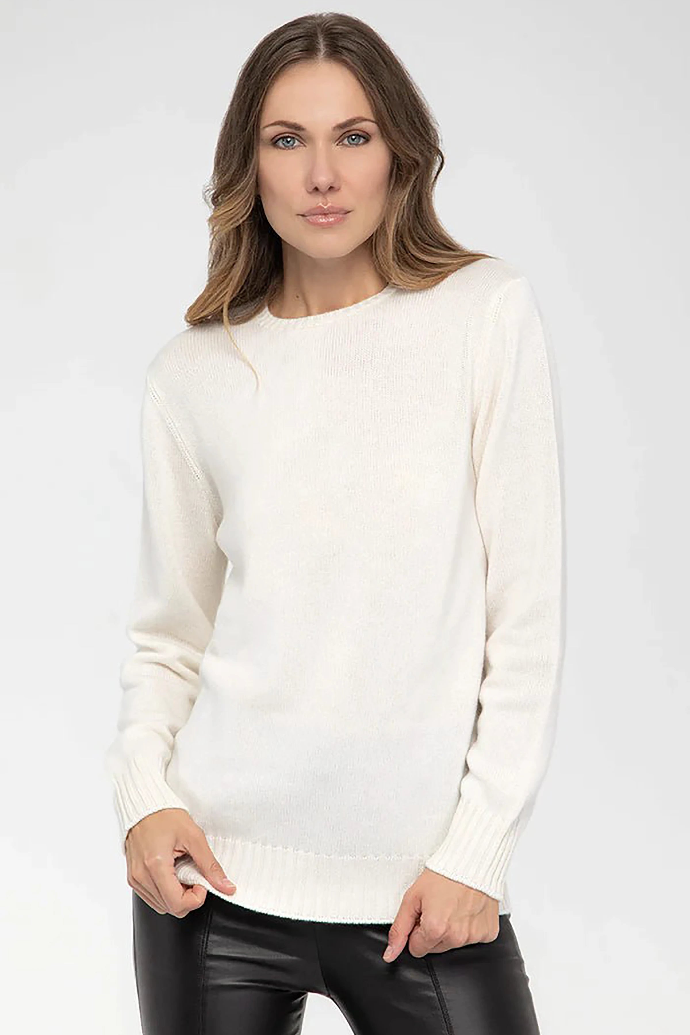 Front view of Italian Fine Cashmere Crewneck in white on model wearing black leather pants - L'Atelier Global