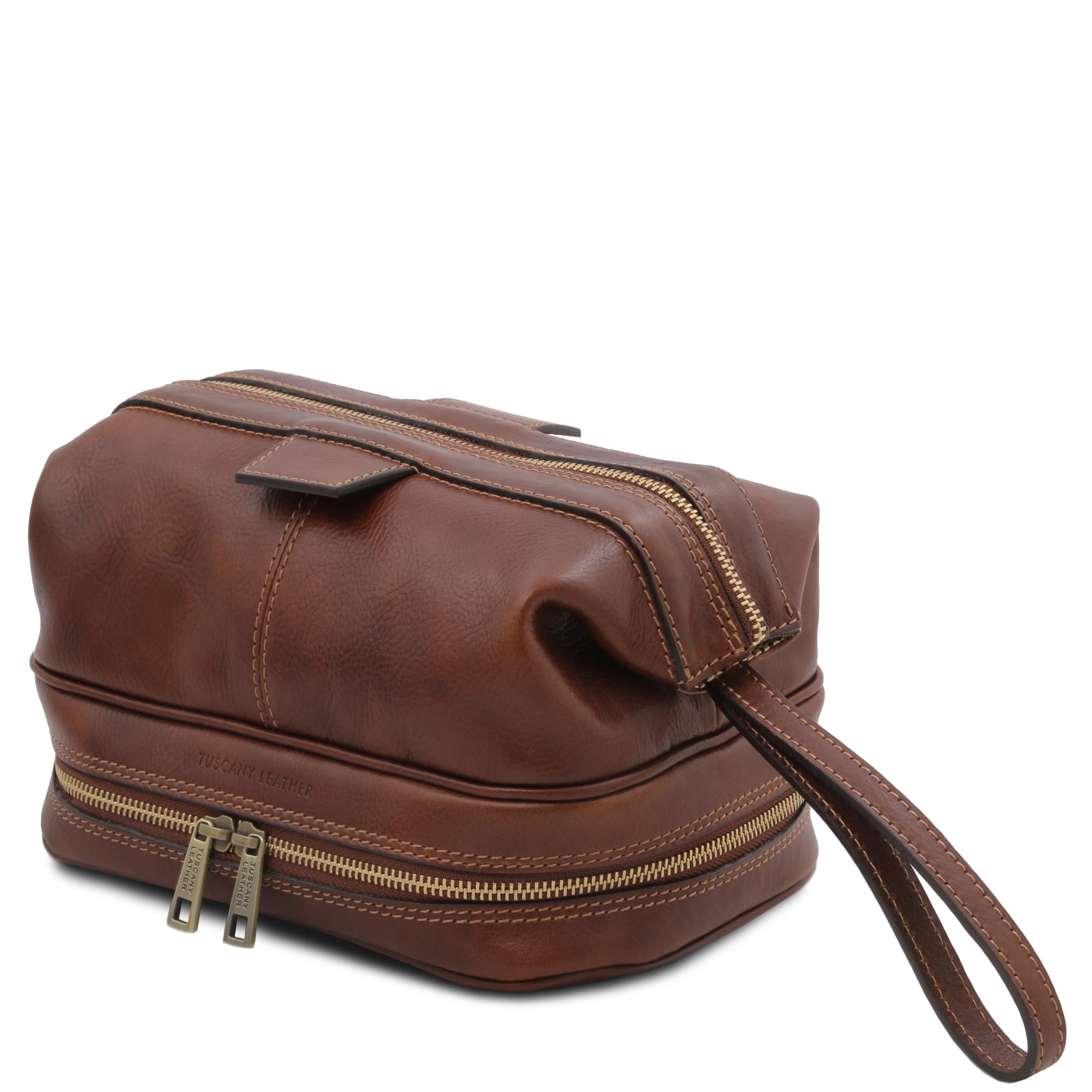 Side view showing handle, Jacob Leather Toilet Bag in brown on a white background