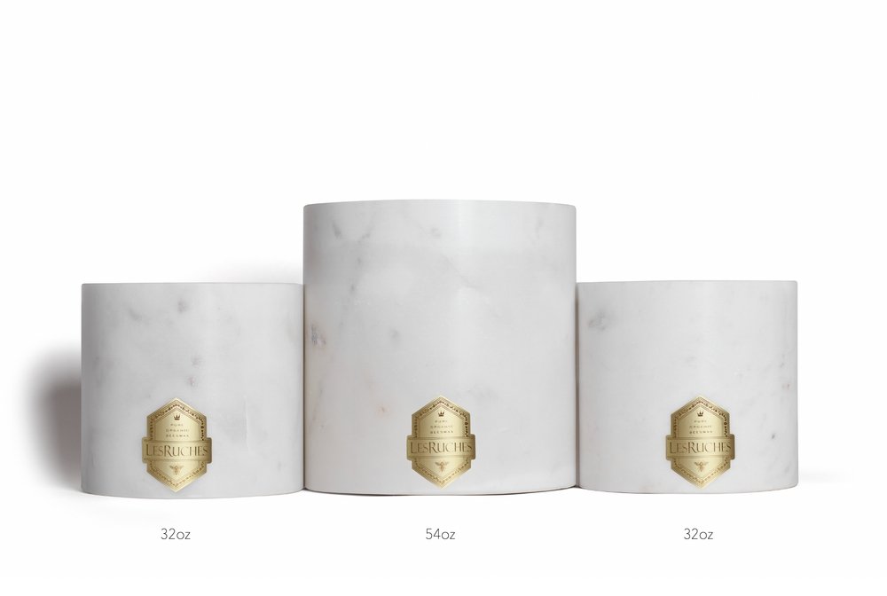 32oz and 54 oz white onyx vessels shown next to each other for size comparison