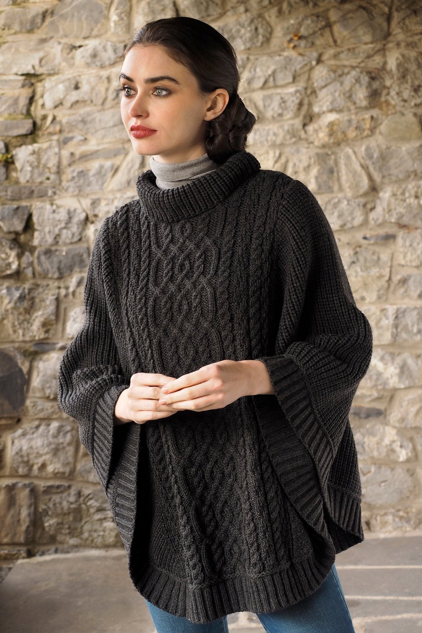 Kildare Effortless Supersoft Relaxed Turtleneck Poncho in Charcoal on model wearing black pants