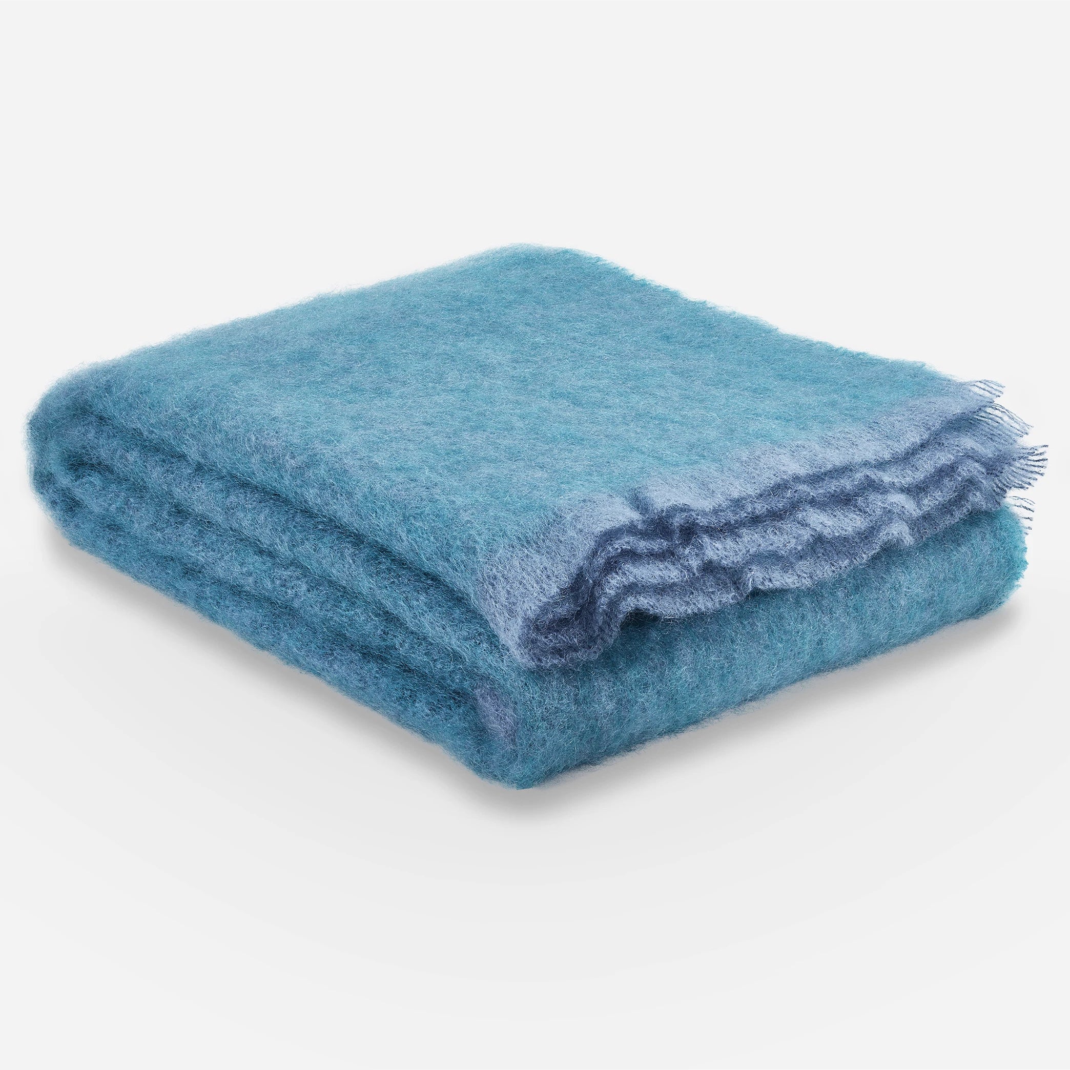 Irish Kilkenny Vibrant Blue Melange with blue trim, Handloomed Plush Mohair Throw folded in a square on a white background