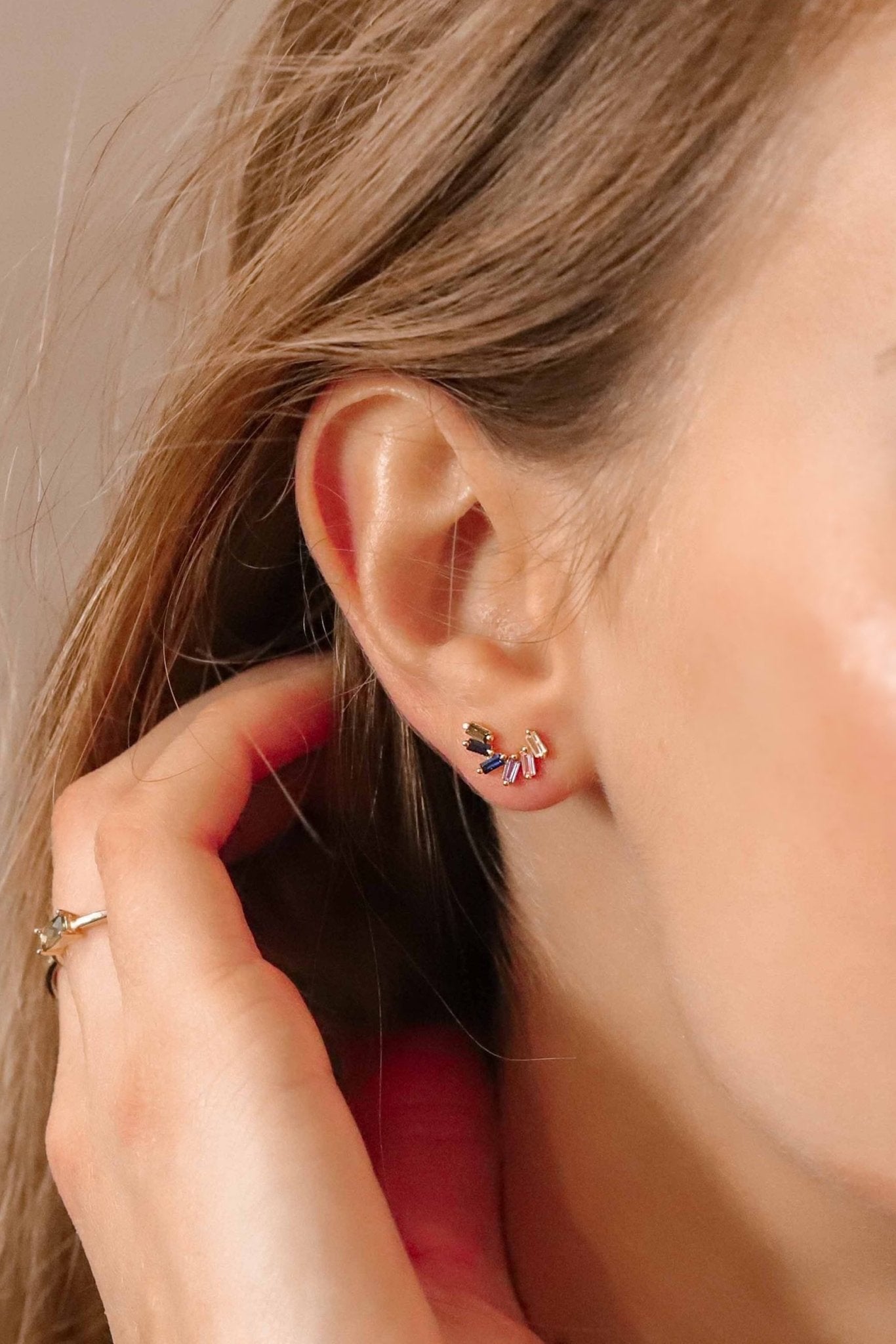 La Barrosa Colorful Earrings on a model showing her right ear