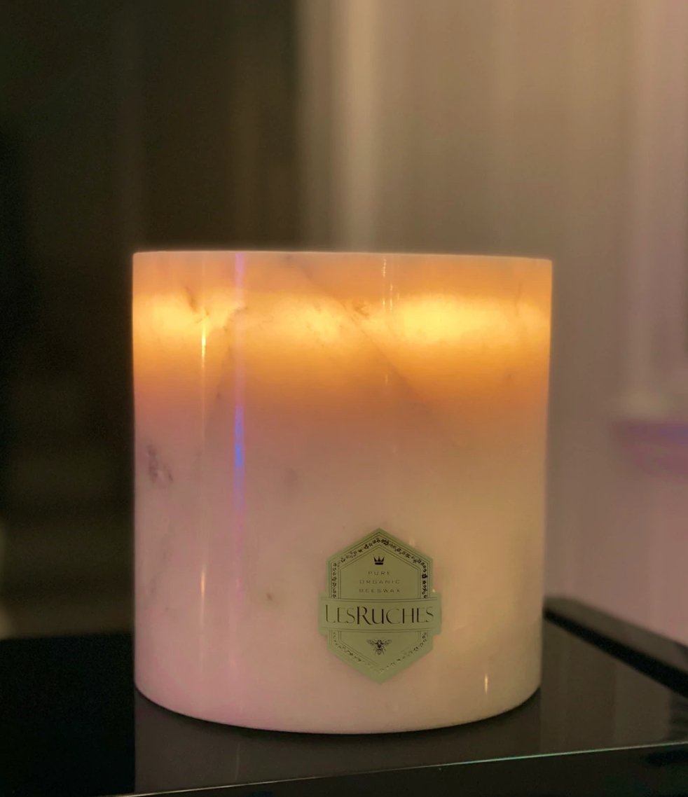 Le Tabac Grandé M2 Edition Marbré Candle 54 oz lit in a dark room