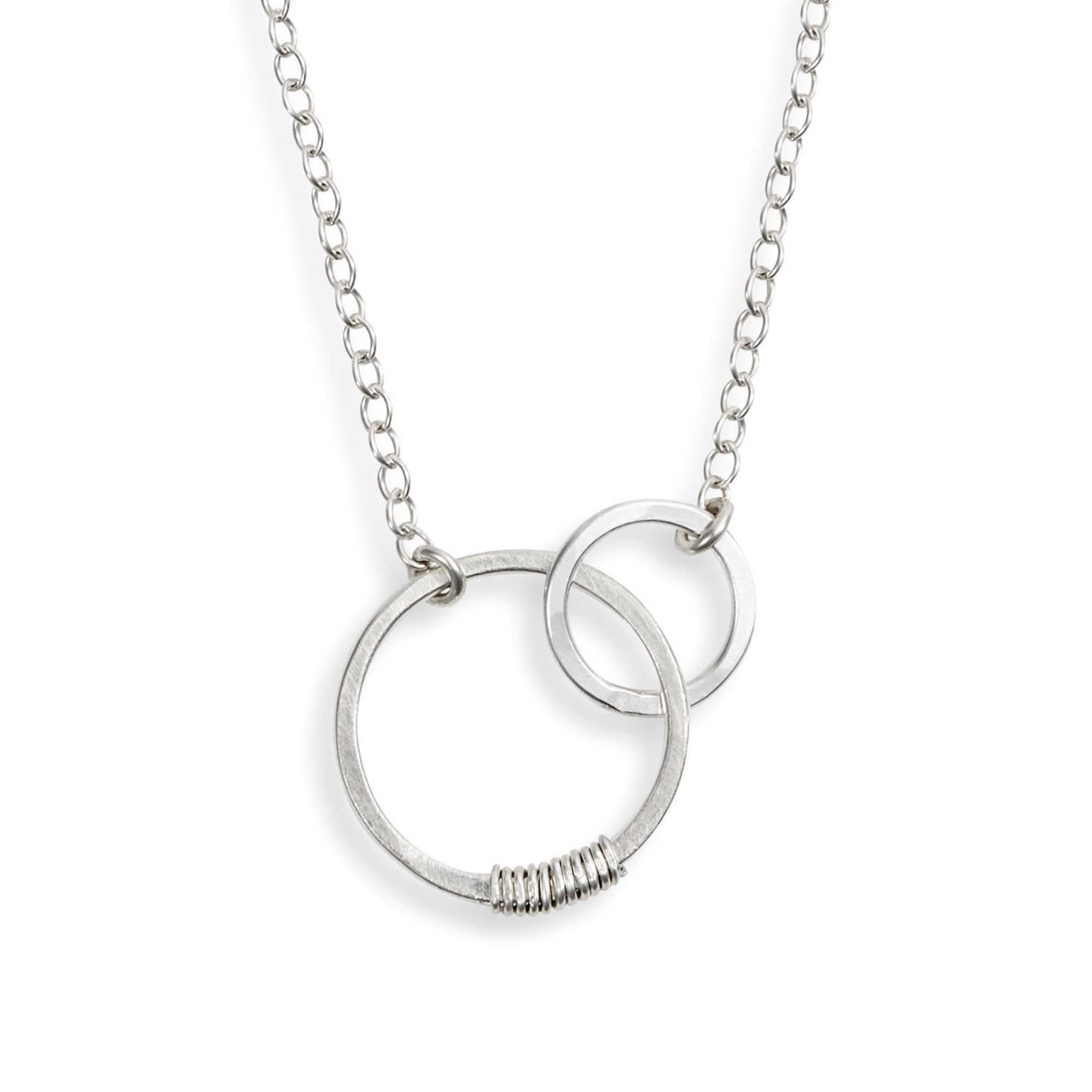 Linked Circles Silver Necklace on a white background - L'Atelier Global