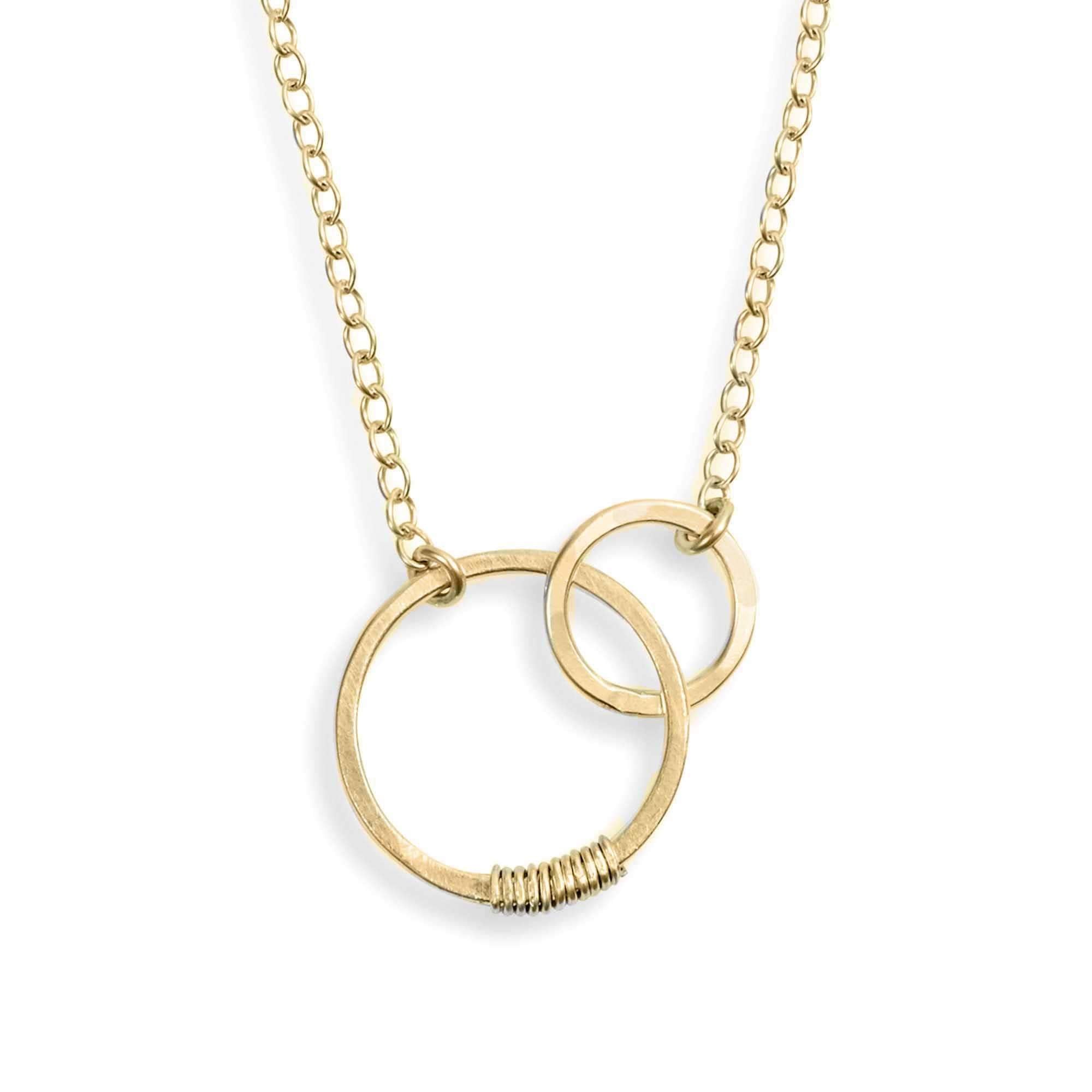 Linked Circles Gold Necklace on a white background - L'Atelier Global