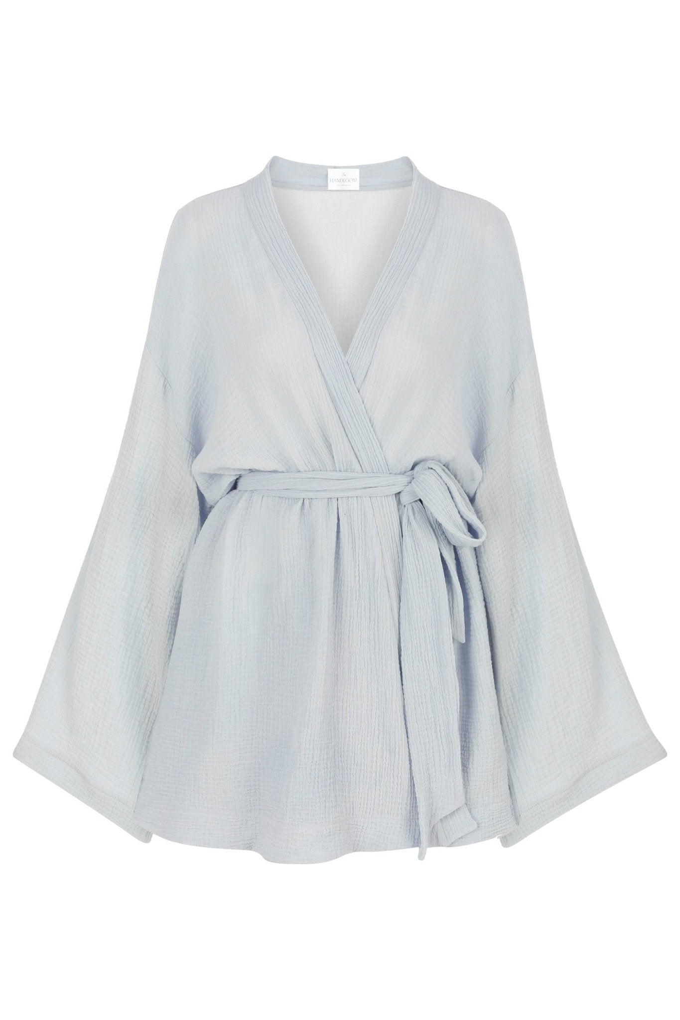 Luxe Luna Kimono Wrap in front of a white background showing flaired kimono sleeves
