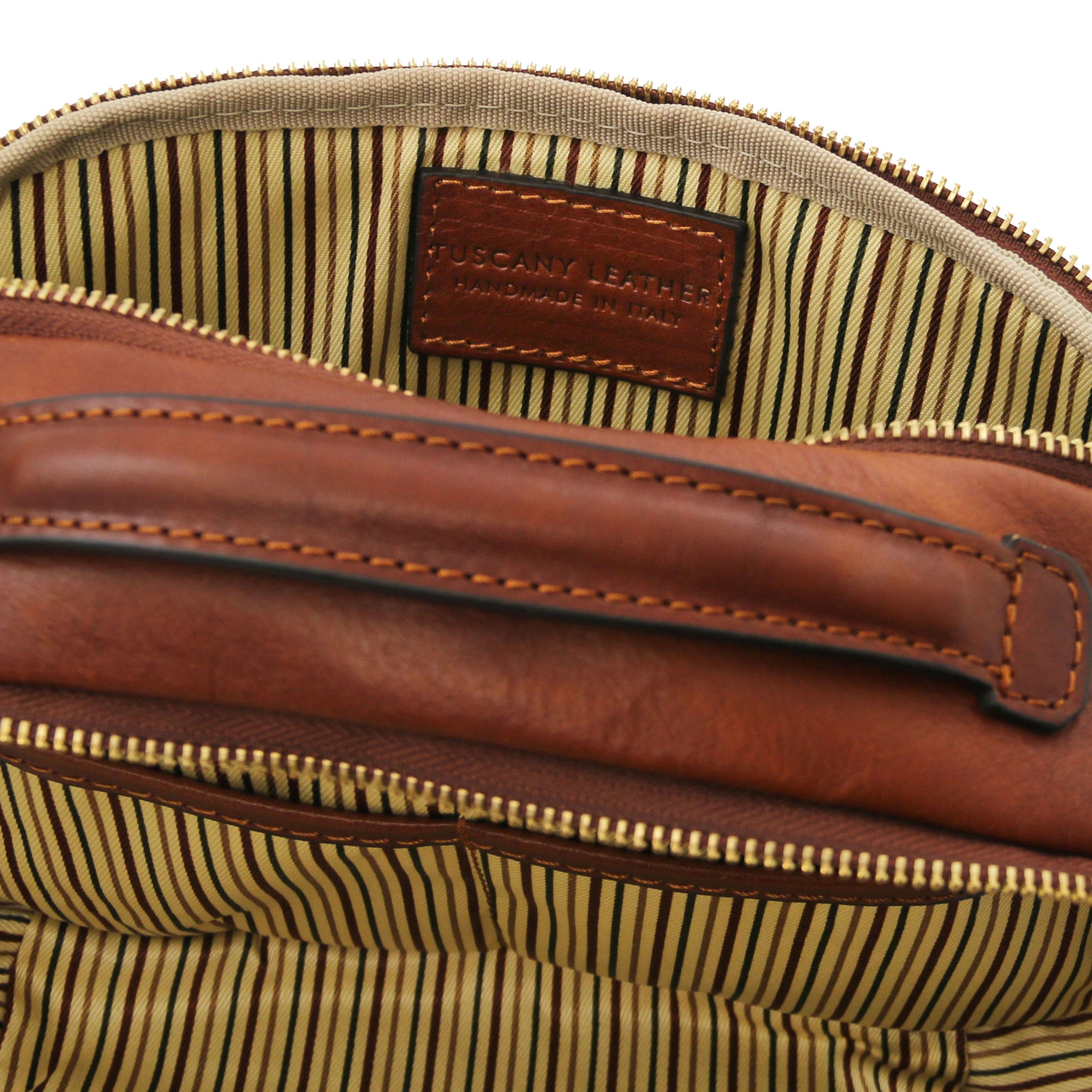 Interior view Marvin Italian Leather Toiletry Bag in Brown showing opened compartments and striped lining