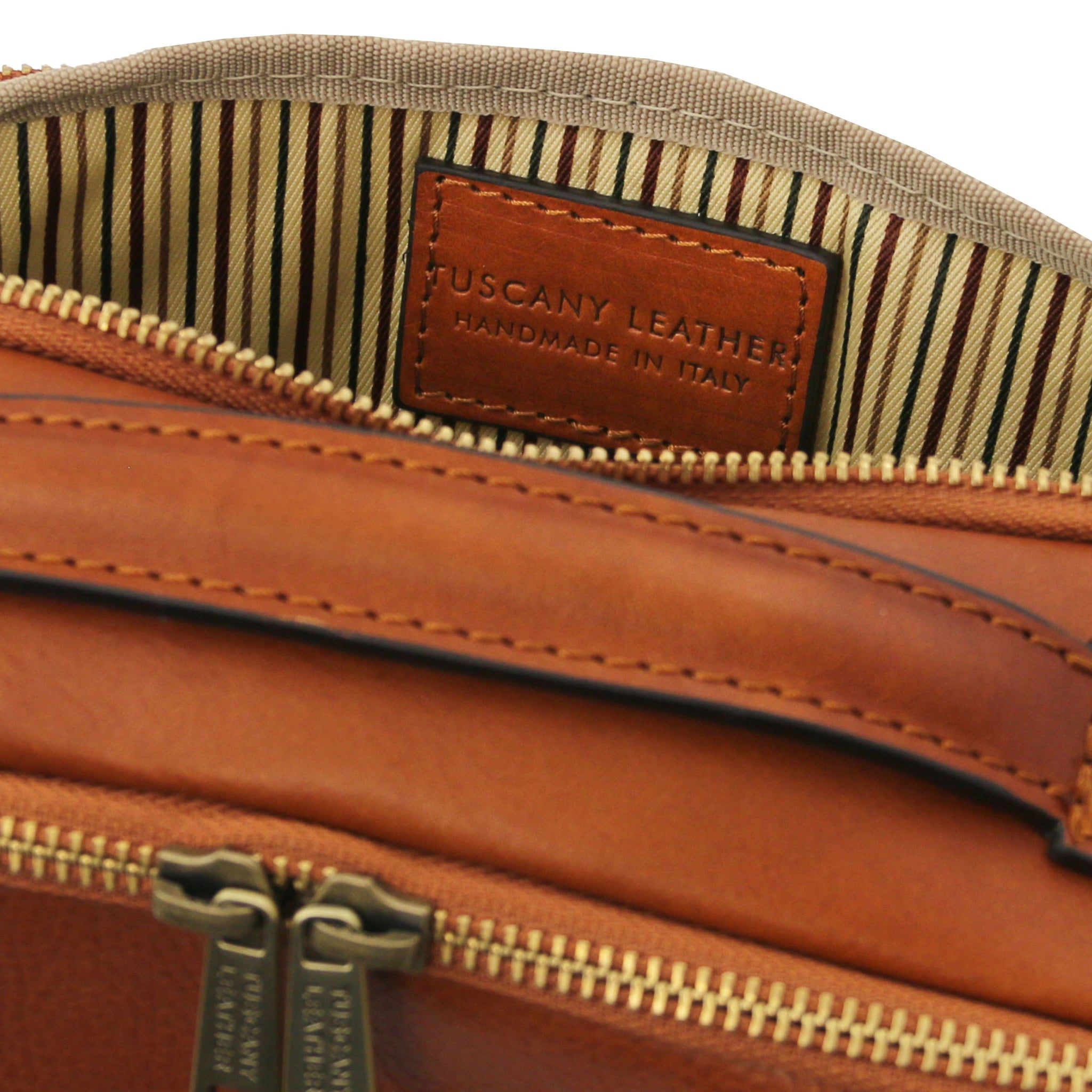 Interior view Marvin Italian Leather Toiletry Bag in Natural showing opened compartments and striped lining