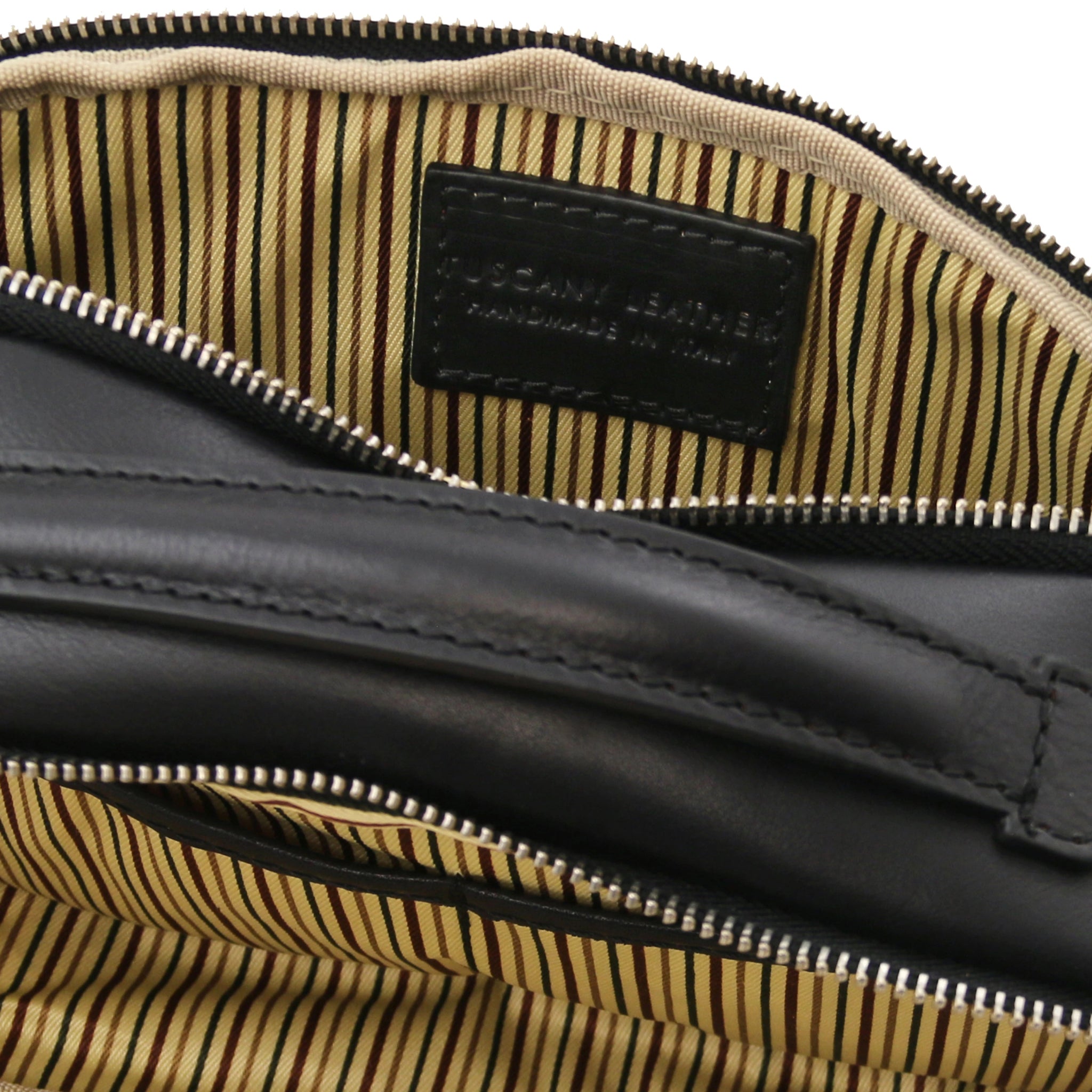 Interior view Marvin Italian Leather Toiletry Bag in Black showing opened compartments and striped lining
