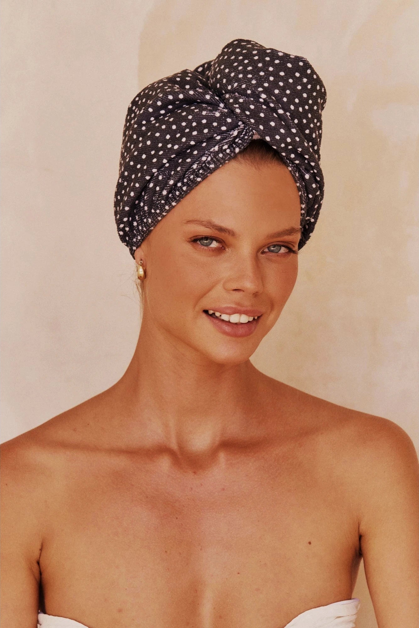 Microfiber Hair Towel in French Navy Polka Dot wrapped around a woman's head