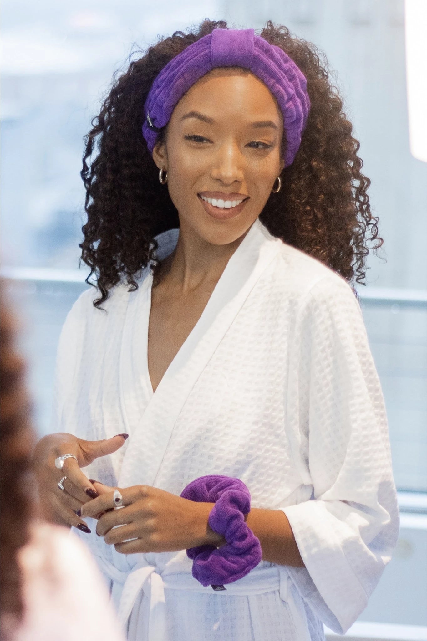 Microfiber Spa Day Luxe Set in purple on model shows the Headband, Twist Towel and Super Scrunchie - L'Atelier Global