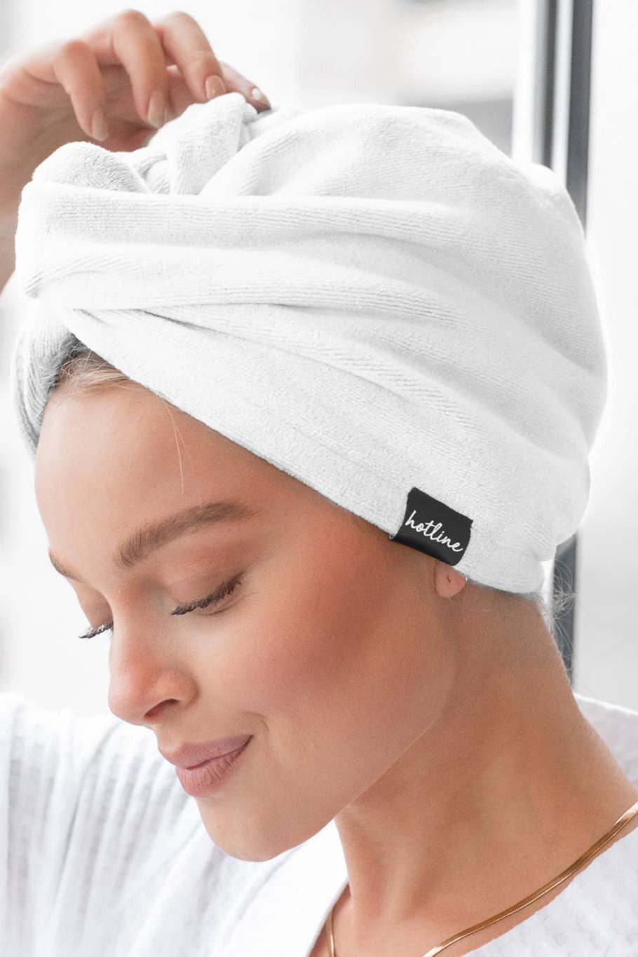 Microfiber Spa Day Twist Towel in white on model - L'Atelier Global
