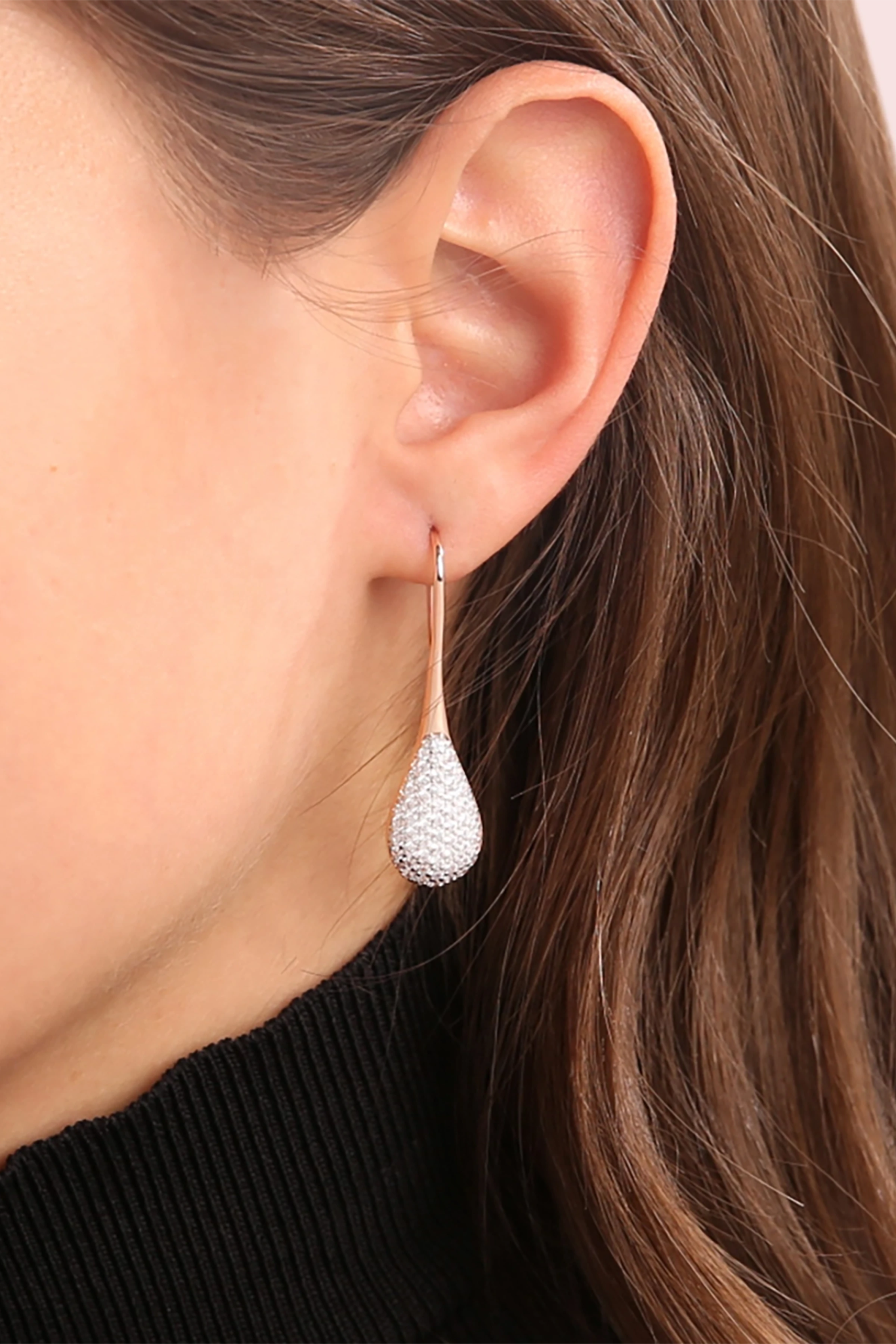 Milano Pavé Teardrop Pendant Golden Rosé Earrings on a model's right ear - L'Atelier Global