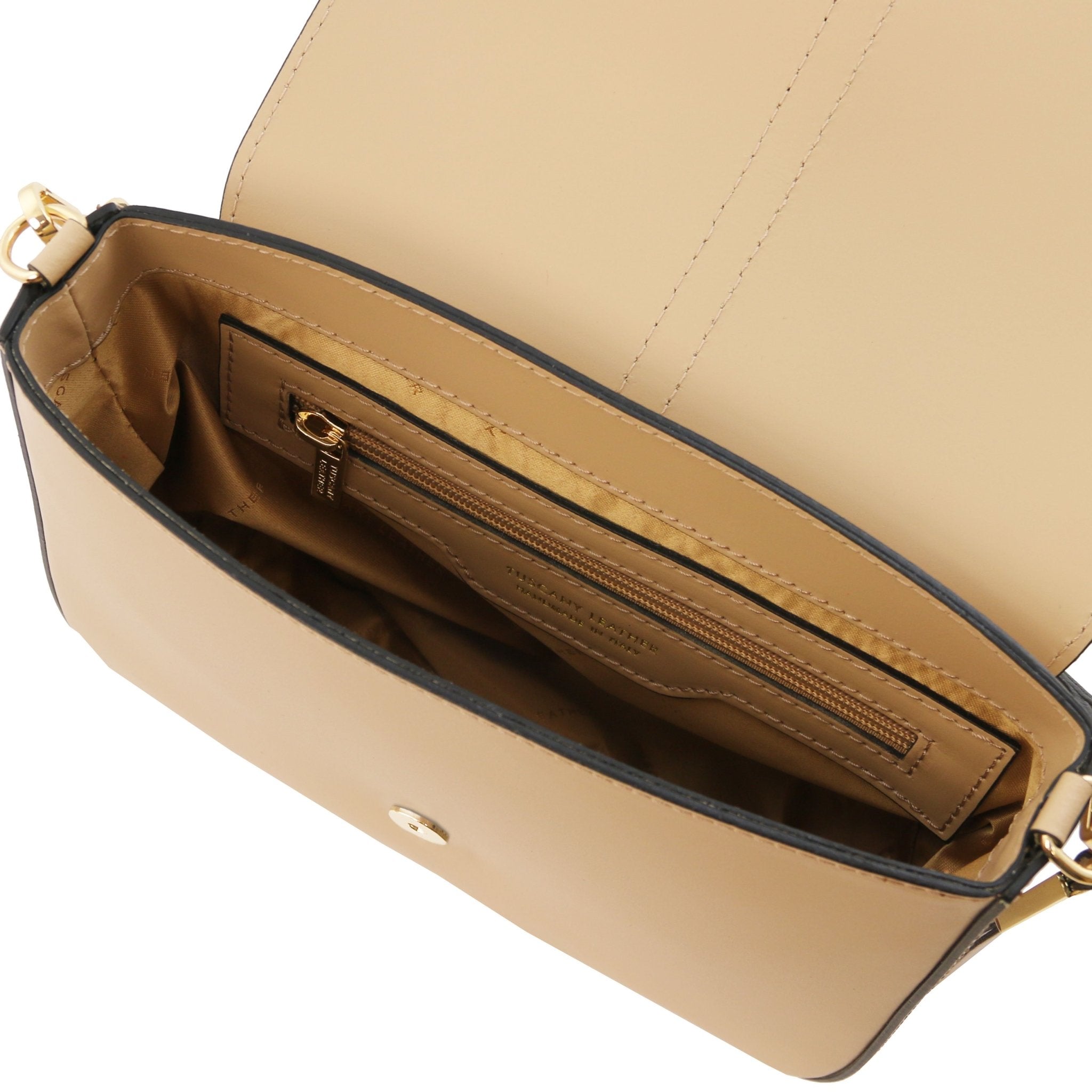 Interior Zip Pocket View Nausica Leather Shoulder Bag in Champagne showing vibrant matching hued lining