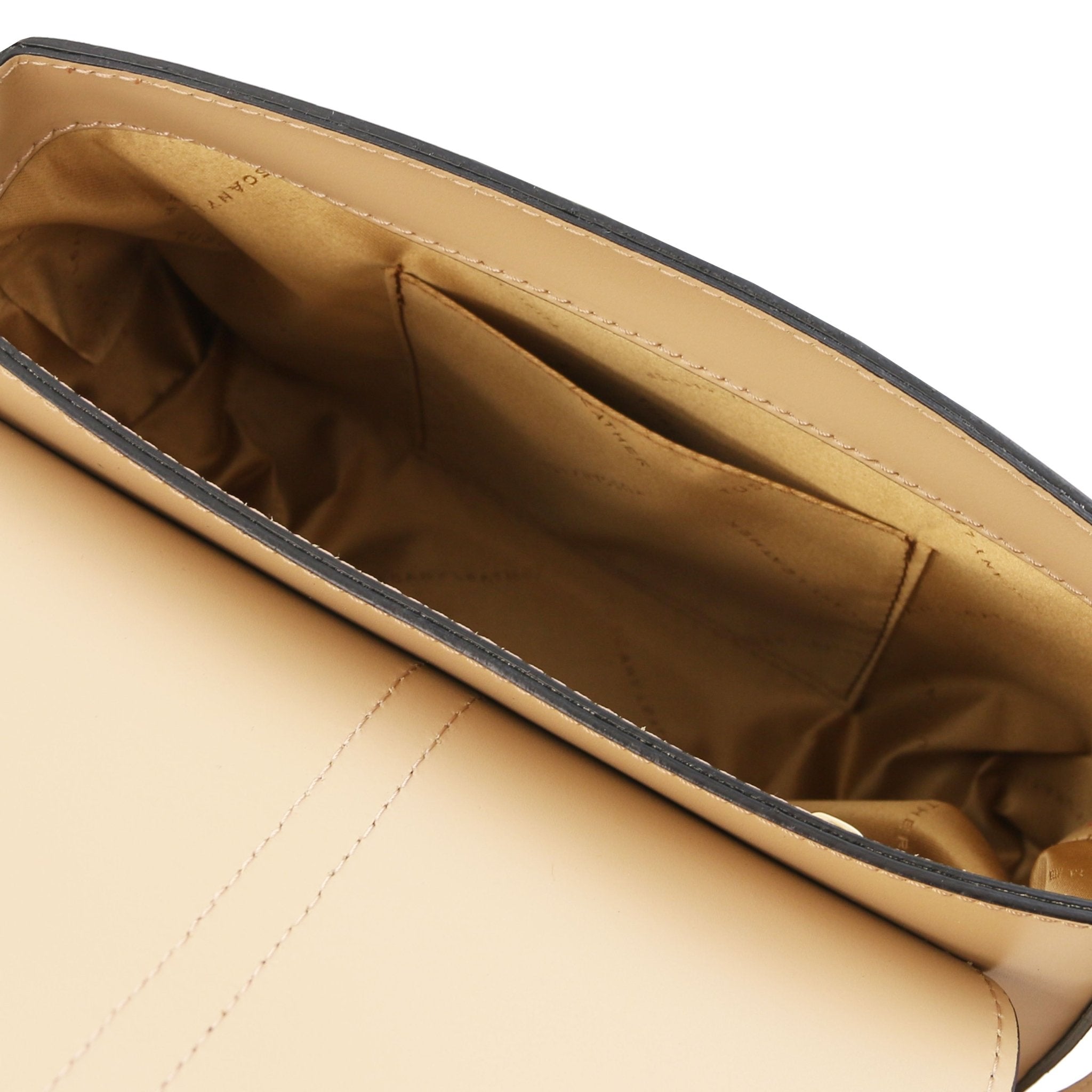 Interior Open Pocket View Nausica Leather Shoulder Bag in Cognac showing natural bag lining