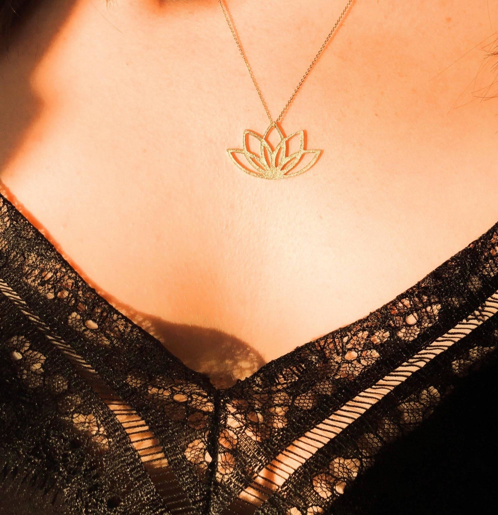 Irish New Beginnings Gold Necklace on a model wearing a black lace dress - L'Atelier Global
