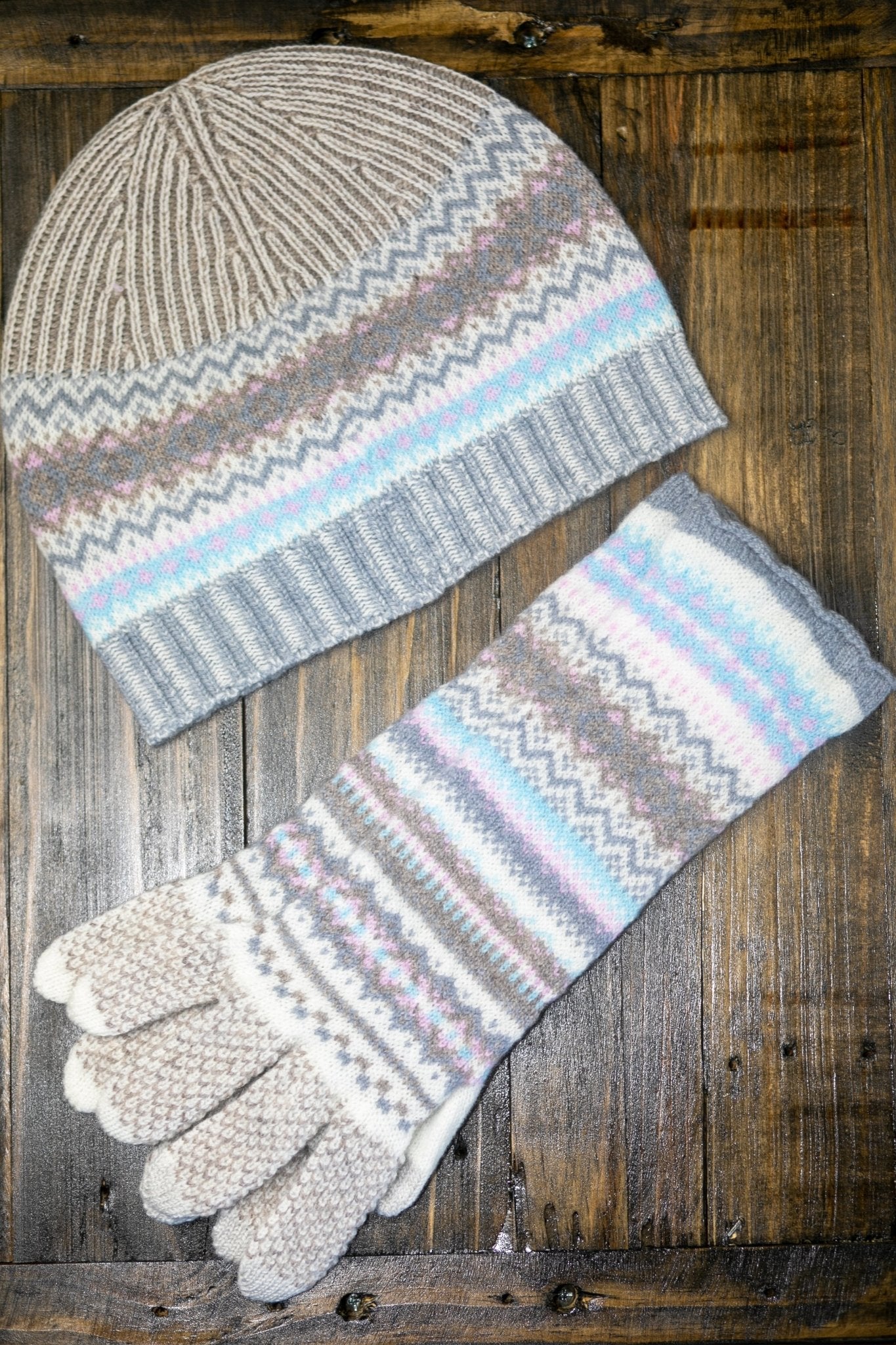 Northern Isles Merino Wool Beanie and Gloves in Mist laying on a wood background - L'Atelier Global
