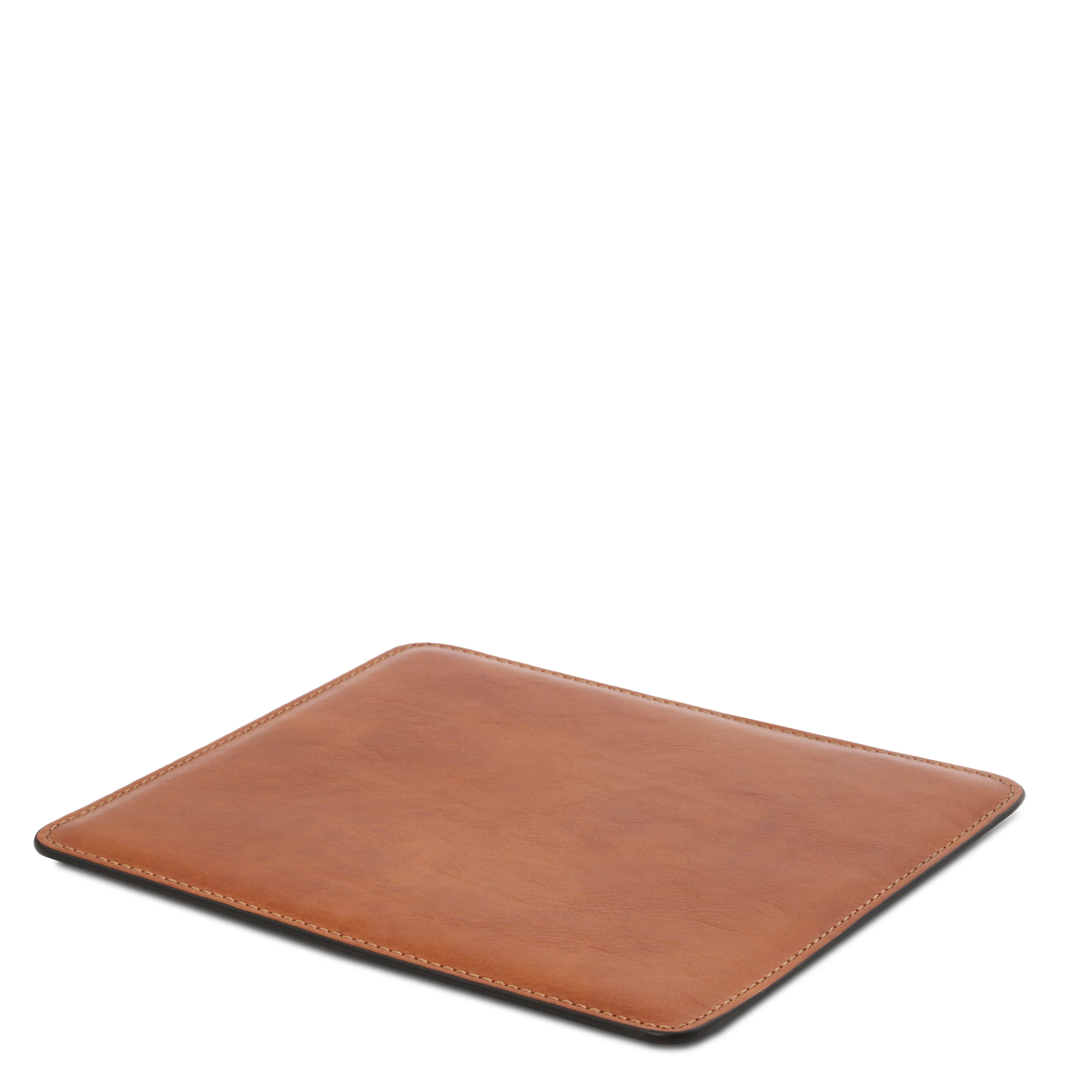 Office Set Leather Mouse Pad in honey laying on a white surface and background