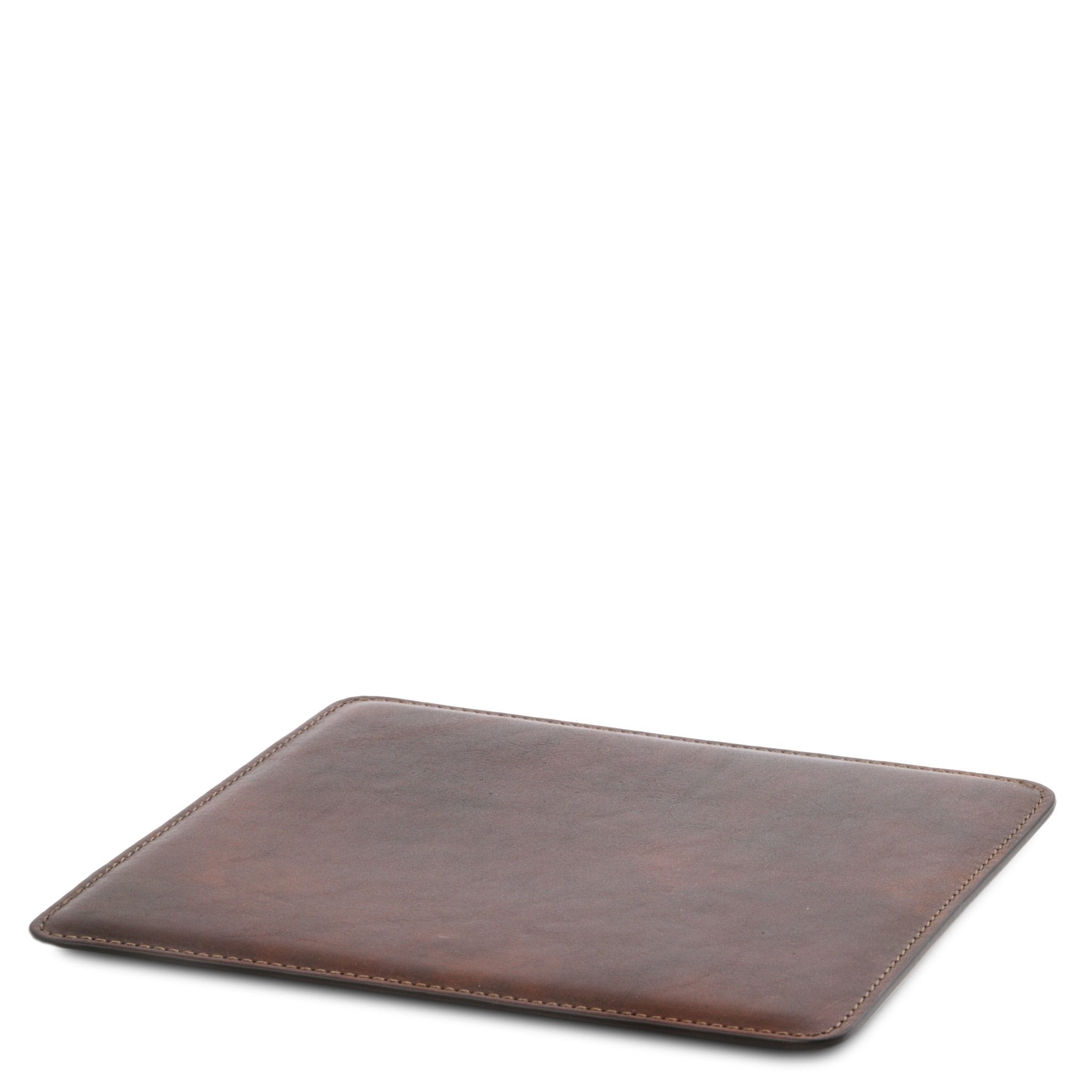 Office Set Leather Mouse Pad in dark brown laying on a white surface and background